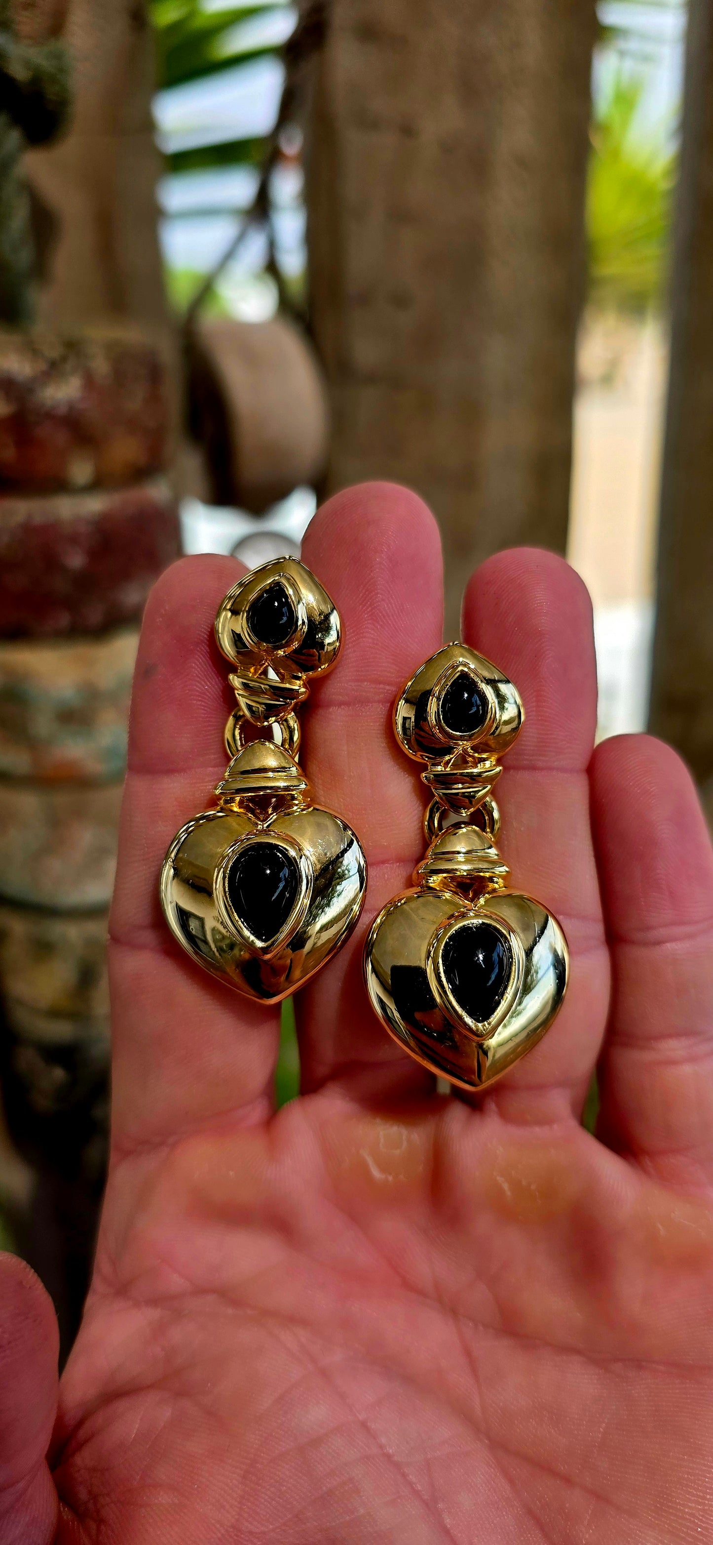 This large and striking pair of vintage 1990’s clip-on earrings captures that unmistakable bold statement style that defined late-20th-century fashion jewellery.