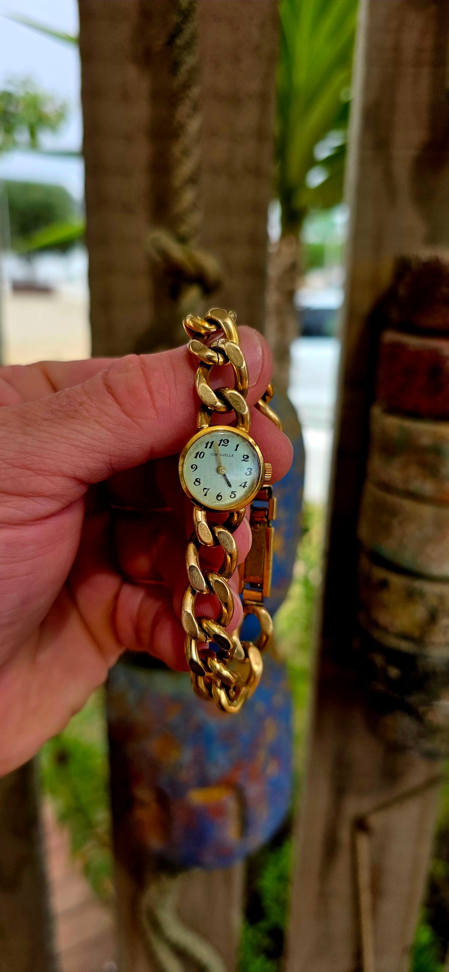 A marvellous vintage Caravelle wristwatch, crafted in yellow gold plating and designed with a bold bracelet-style strap that truly steals the show.