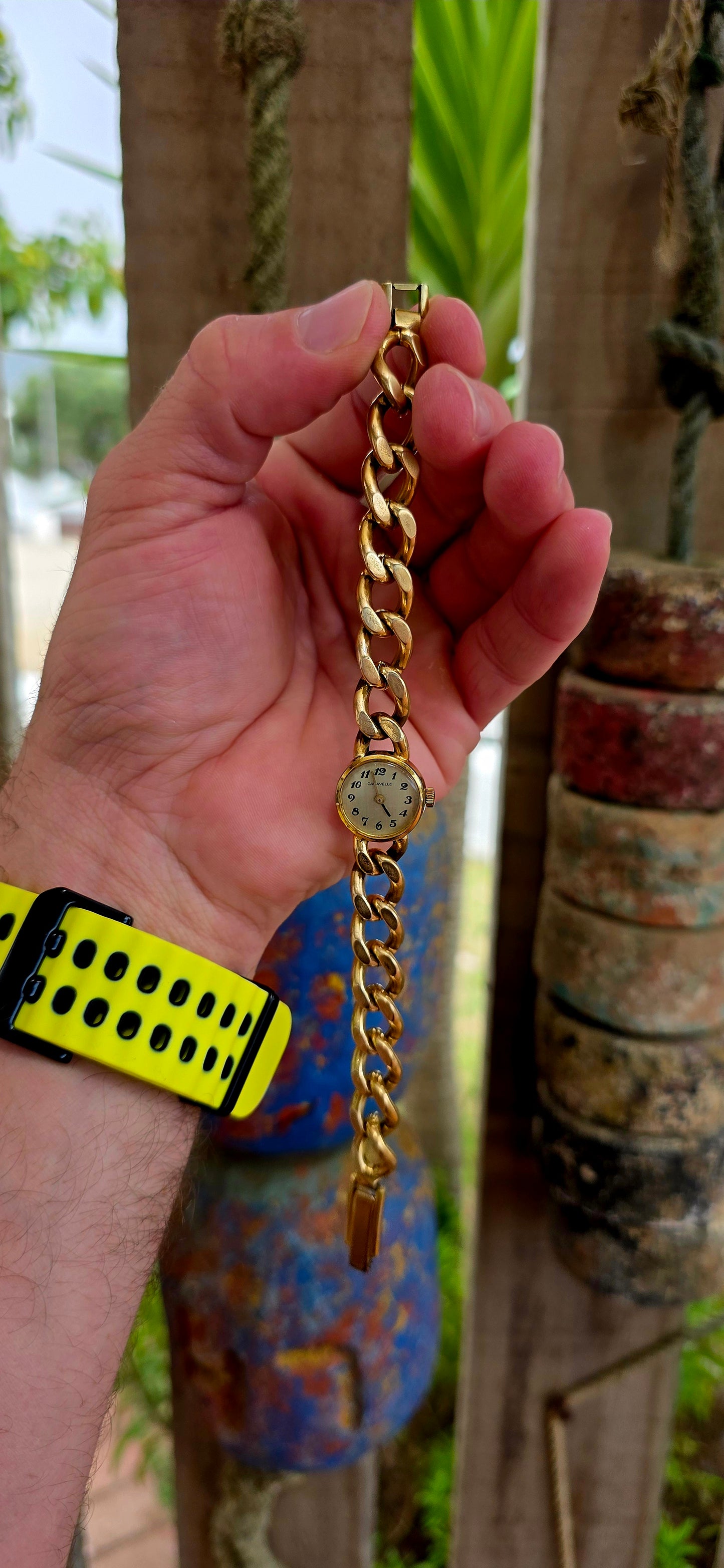 A marvellous vintage Caravelle wristwatch, crafted in yellow gold plating and designed with a bold bracelet-style strap that truly steals the show.
