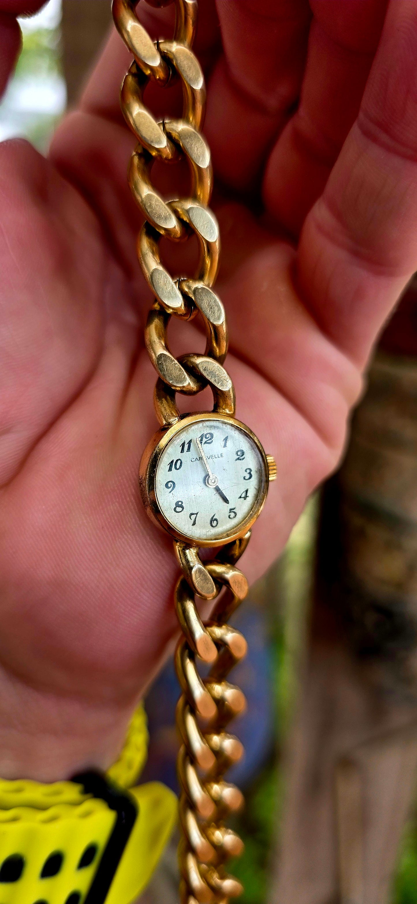 A marvellous vintage Caravelle wristwatch, crafted in yellow gold plating and designed with a bold bracelet-style strap that truly steals the show.