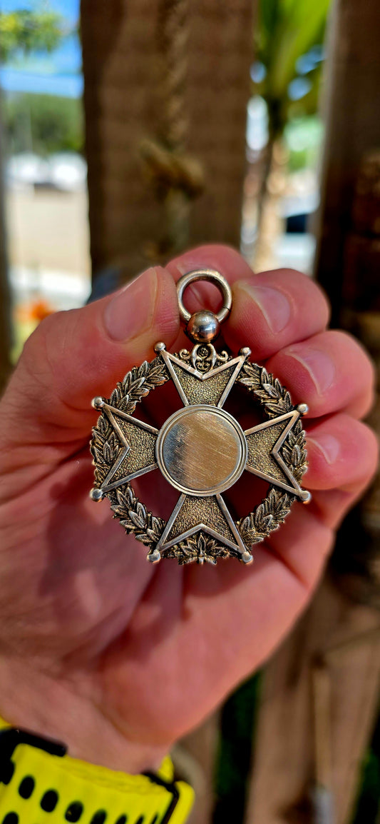 A truly exceptional and generously sized antique fob pendant, dating to circa 1887, and crafted in solid hallmarked sterling silver by the renowned Birmingham silversmith William James Dingley.