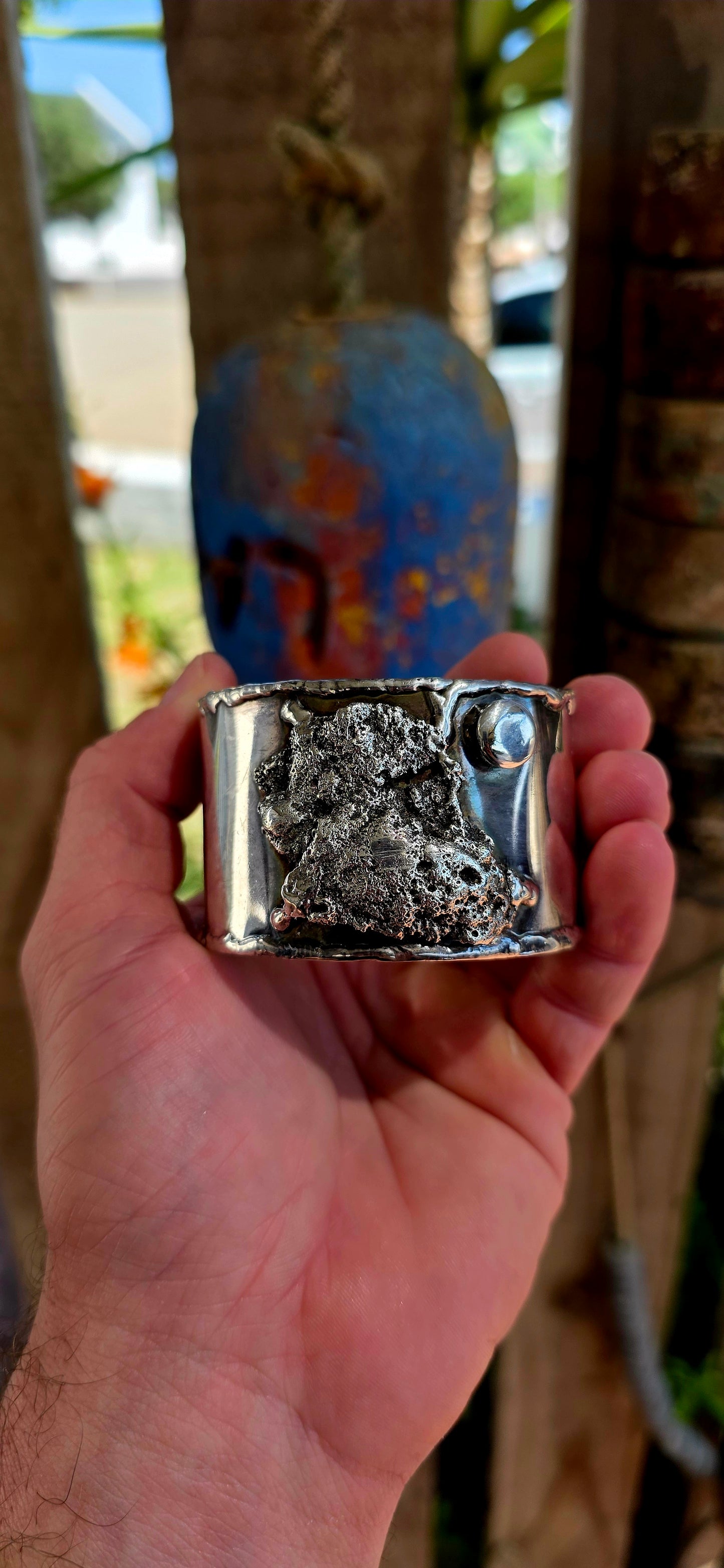 A striking and powerful vintage cuff bangle from the 1970s, crafted in silver-plated metal and embodying the unmistakable spirit of modernist brutalist design—where jewellery becomes wearable sculpture.