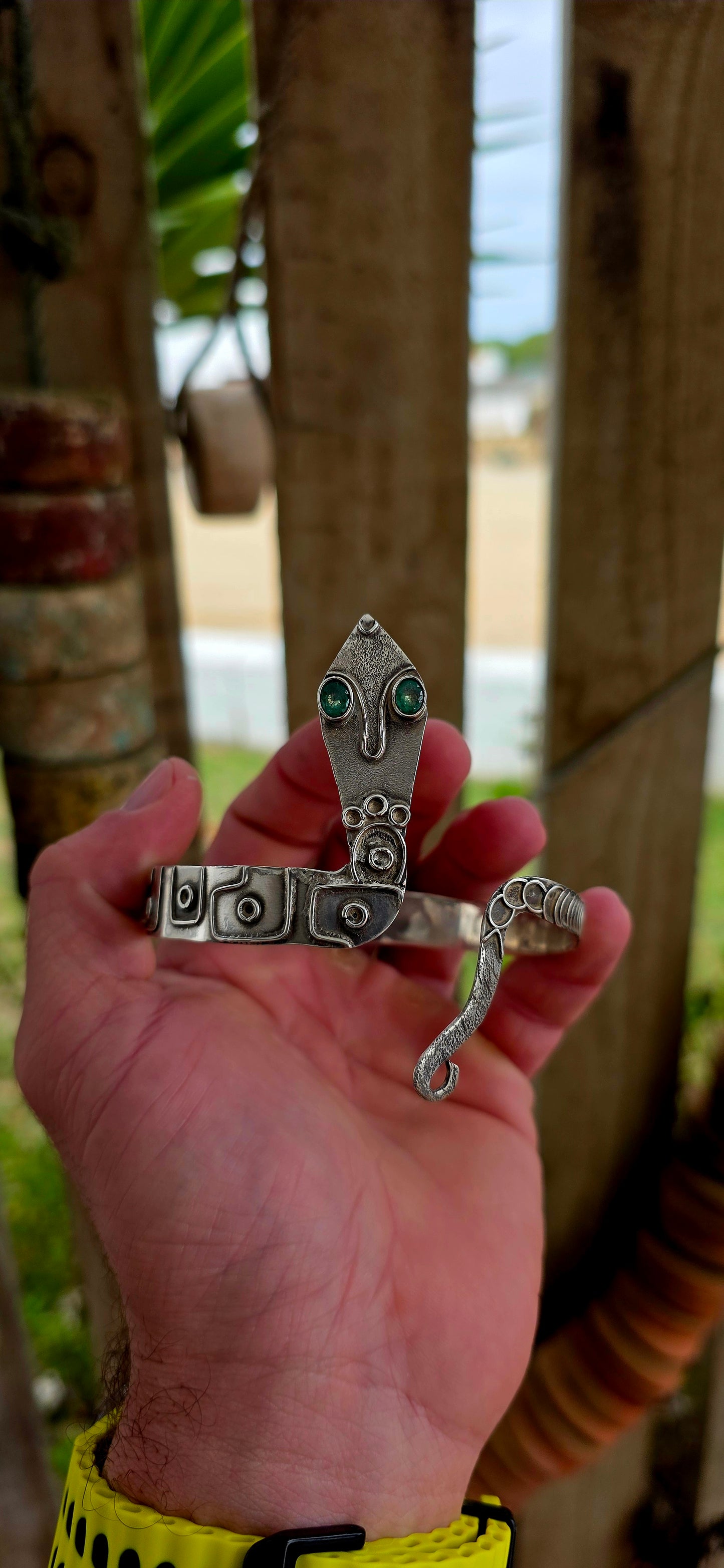 A striking and sculptural vintage Egyptian Revival serpent cuff, crafted in solid sterling silver, designed to wrap boldly around the upper arm or wrist as a true statement of strength and symbolism.