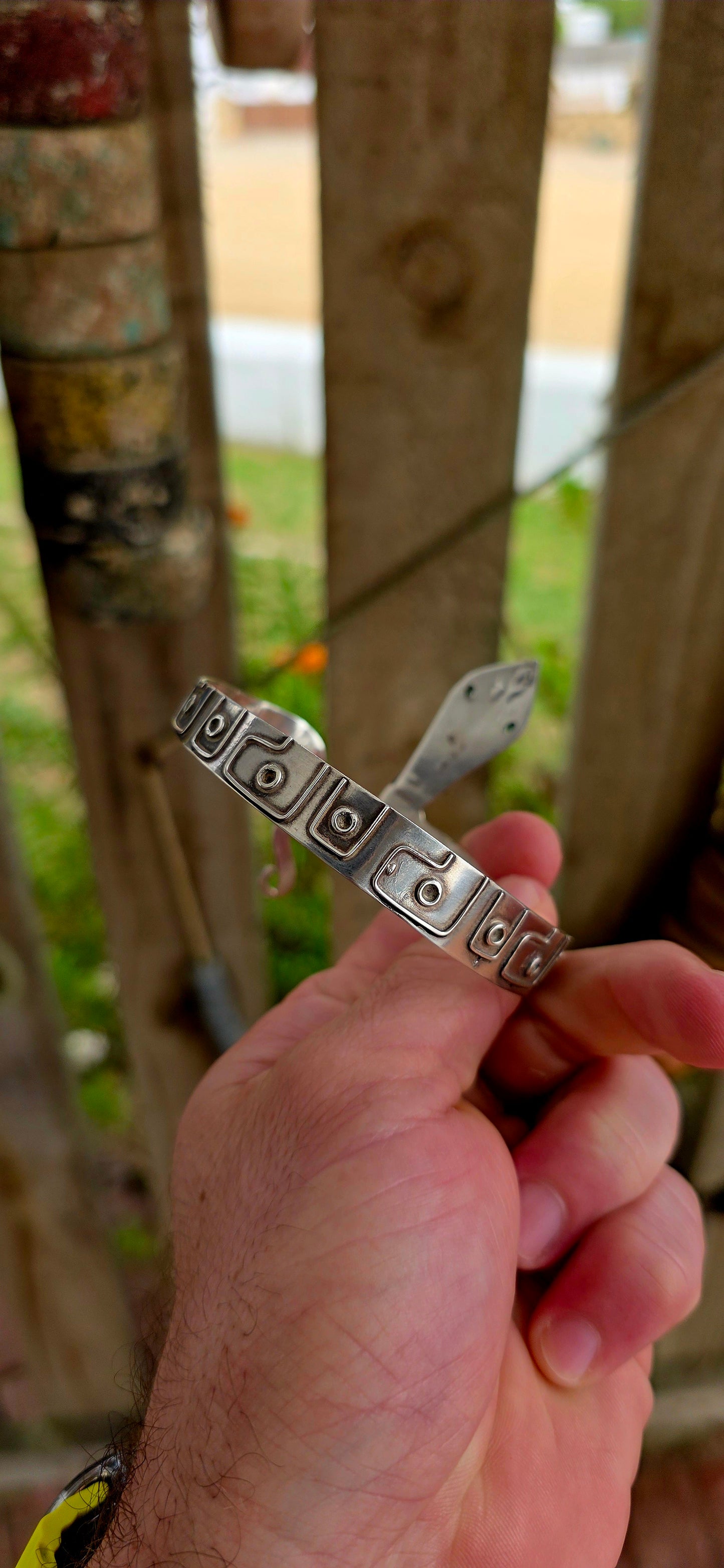 A striking and sculptural vintage Egyptian Revival serpent cuff, crafted in solid sterling silver, designed to wrap boldly around the upper arm or wrist as a true statement of strength and symbolism.