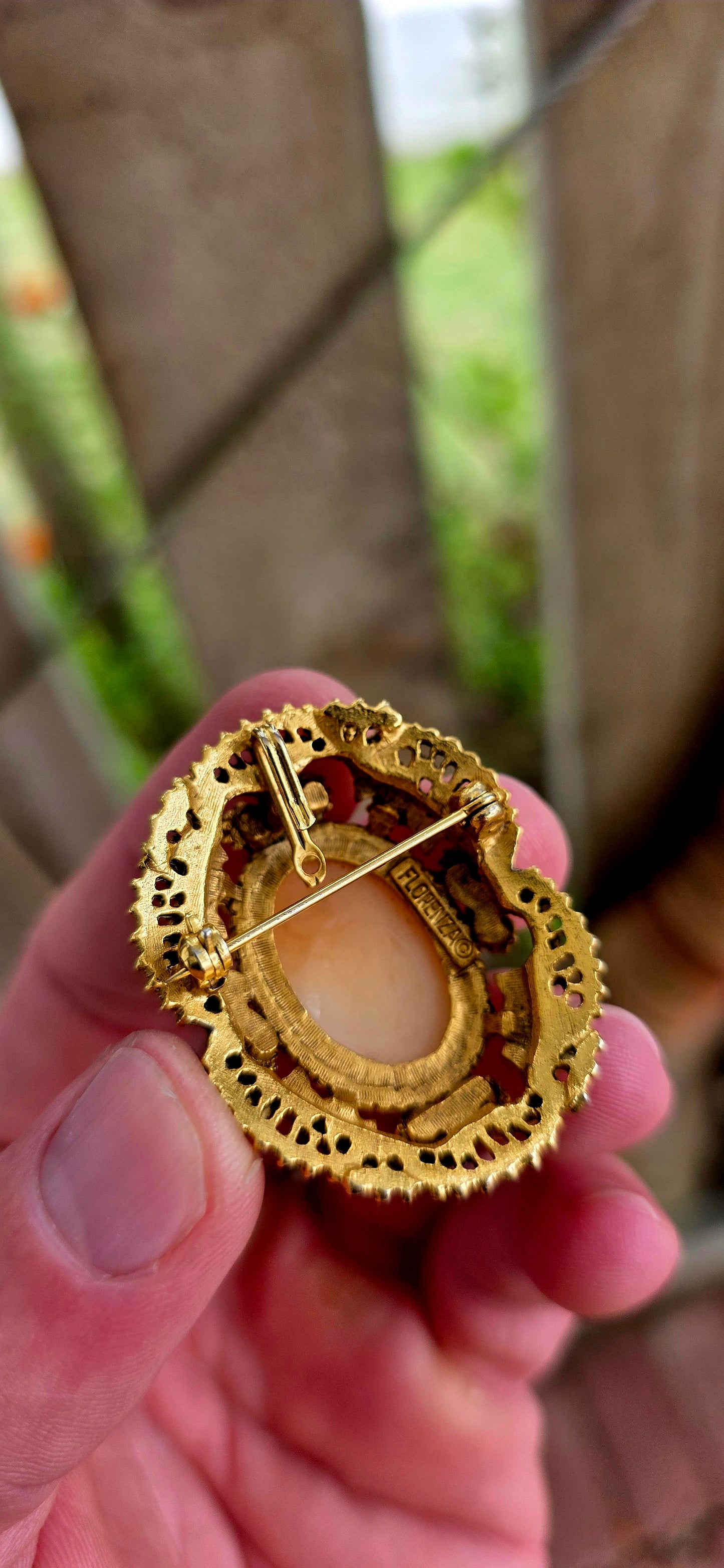 A truly beautiful vintage circa 1960s designer brooch/pendant by Florenza, crafted in their signature rich gold-tone (24k gold plated) finish, dripping in Victorian Revival elegance.