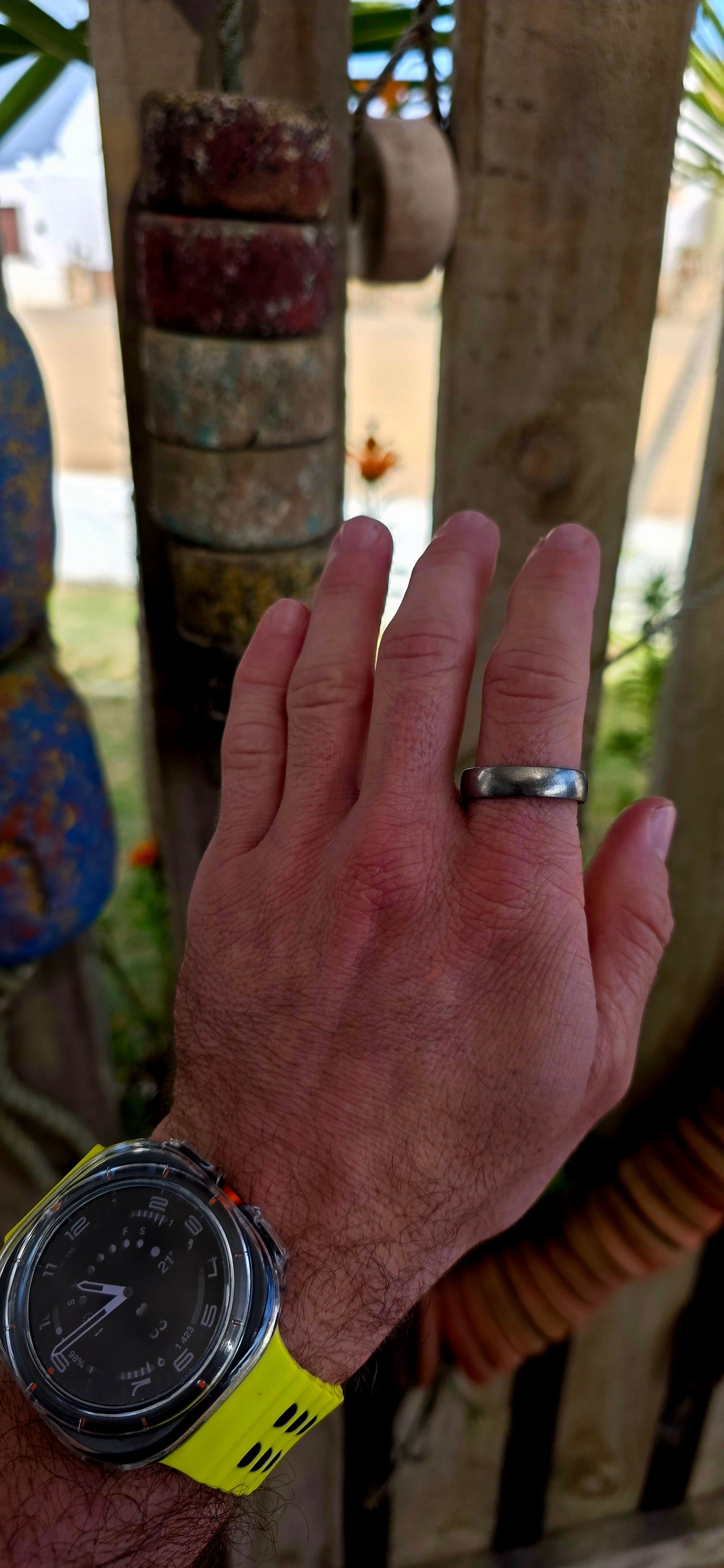 A sleek, mens titanium band ring by renowned South African luxury jeweller Arthur Kaplan — the kind of piece that leans into quiet confidence and everyday power.