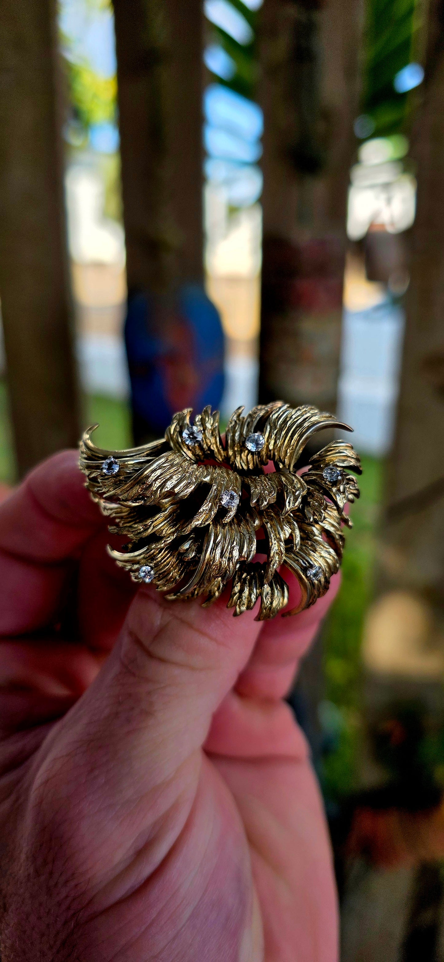 A striking circa 1966 vintage designer brooch by the renowned German house Henkel & Grosse, crafted in rich gold plating and bursting with sculptural energy.
