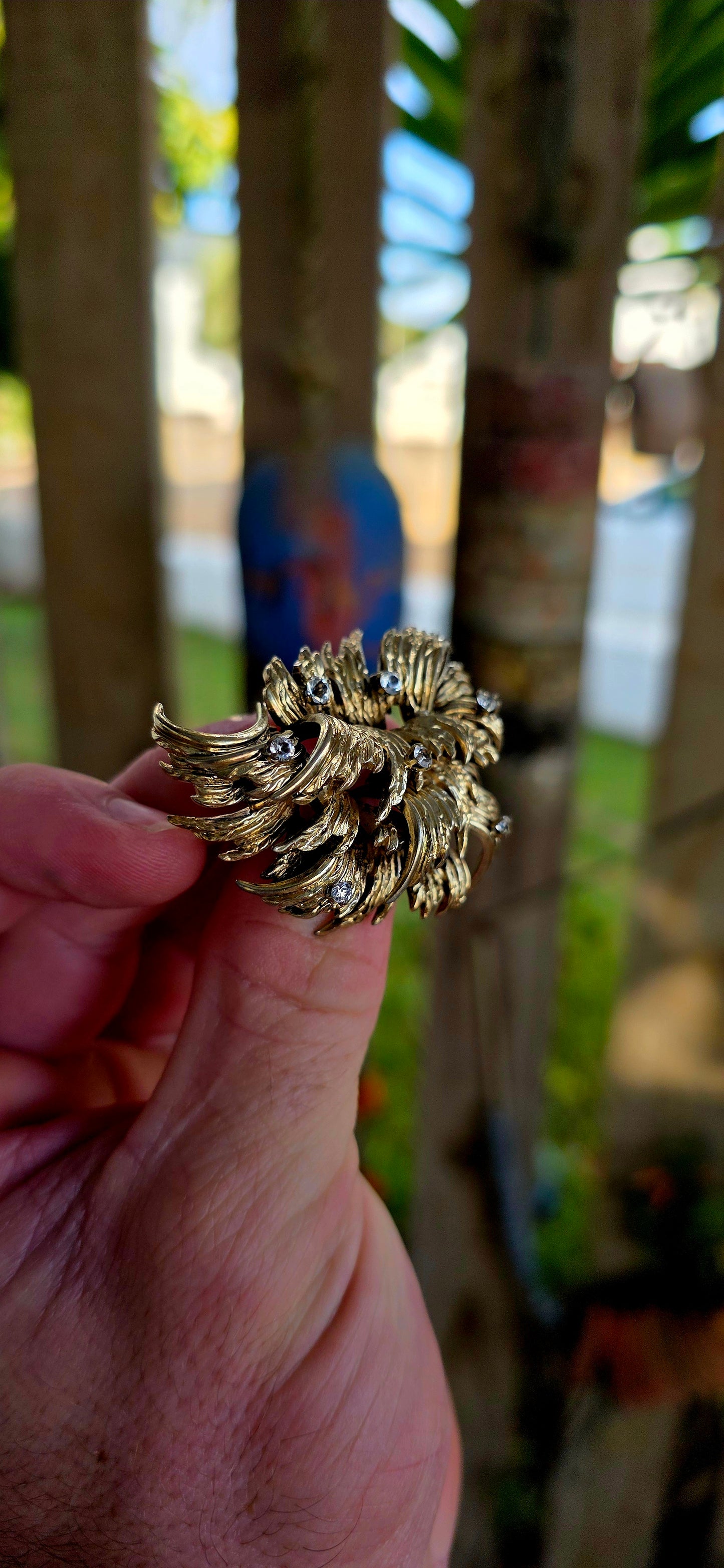 A striking circa 1966 vintage designer brooch by the renowned German house Henkel & Grosse, crafted in rich gold plating and bursting with sculptural energy.