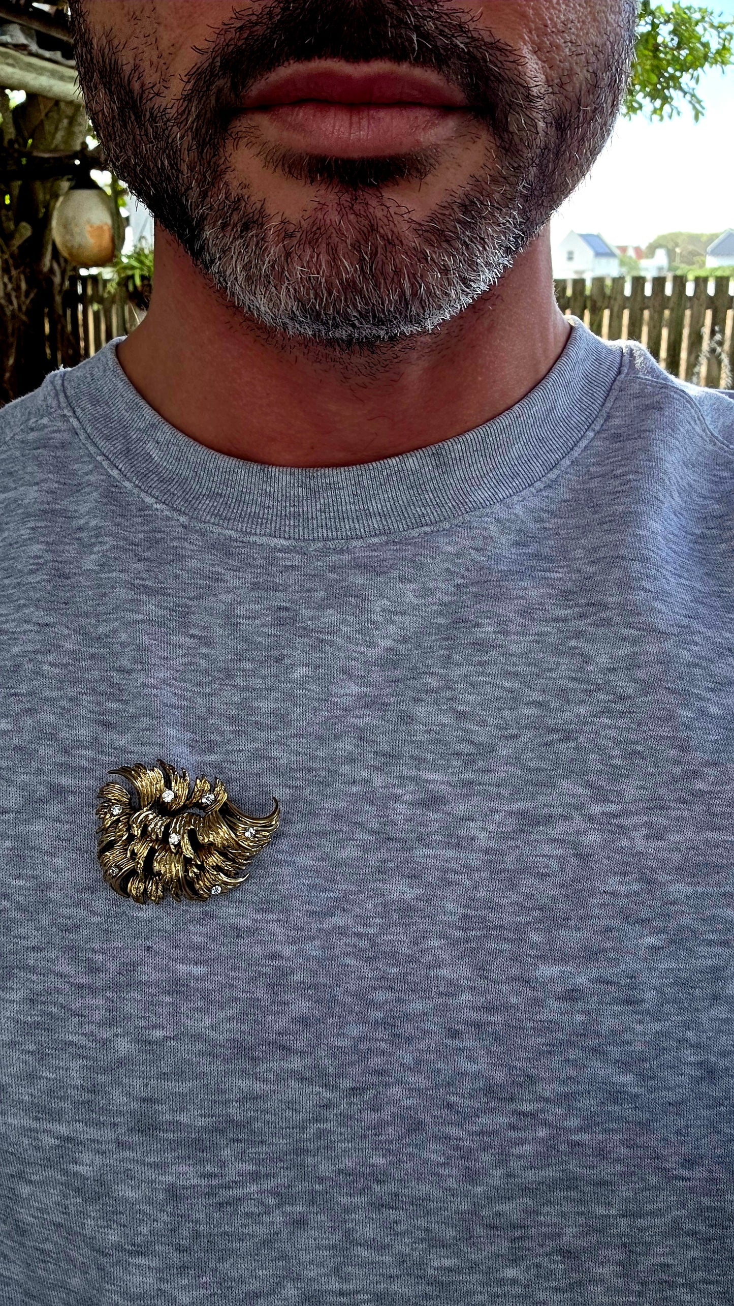 A striking circa 1966 vintage designer brooch by the renowned German house Henkel & Grosse, crafted in rich gold plating and bursting with sculptural energy.
