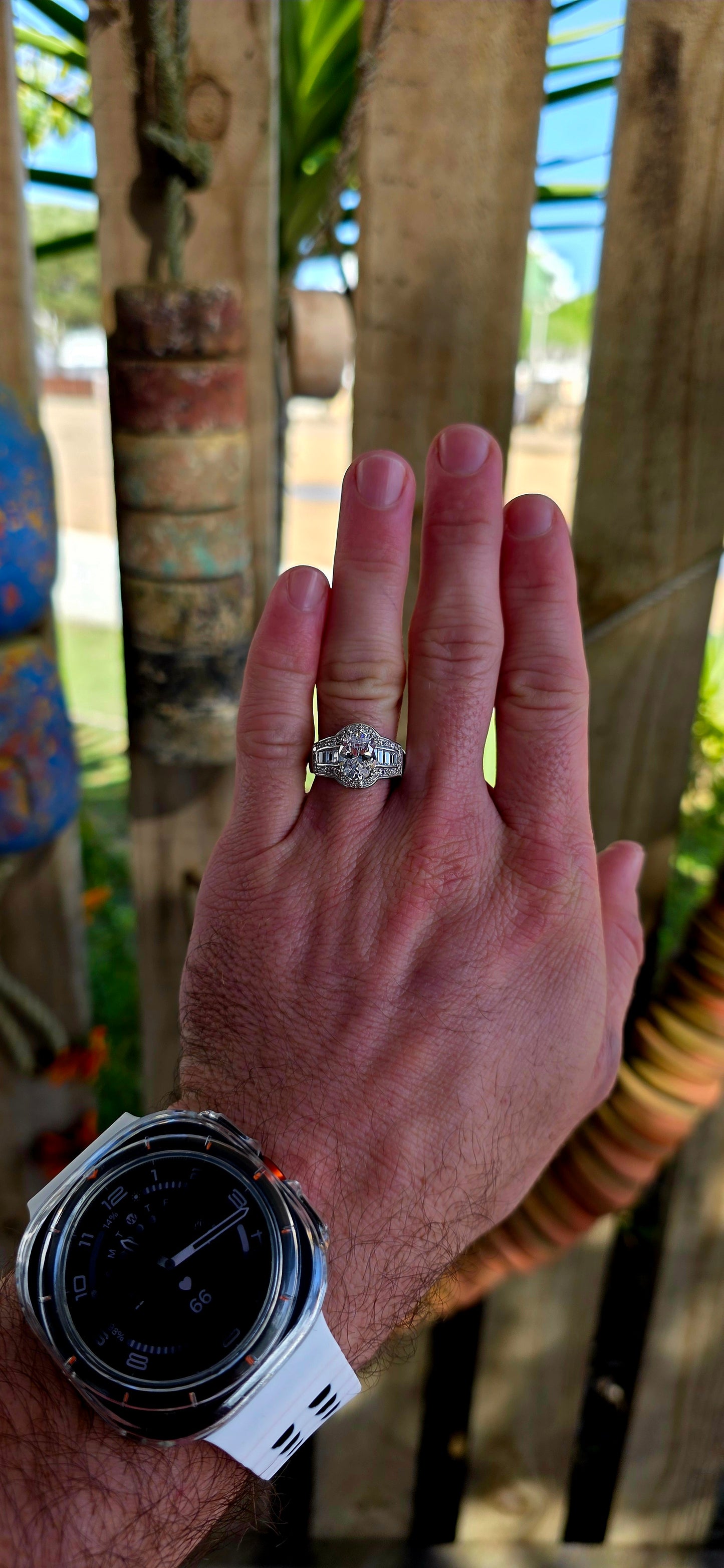 A high-quality designer-crafted sterling silver dress ring, set with a large oval-cut cubic zirconia at the centre, elevated in elegant prong settings to maximise light and sparkle.