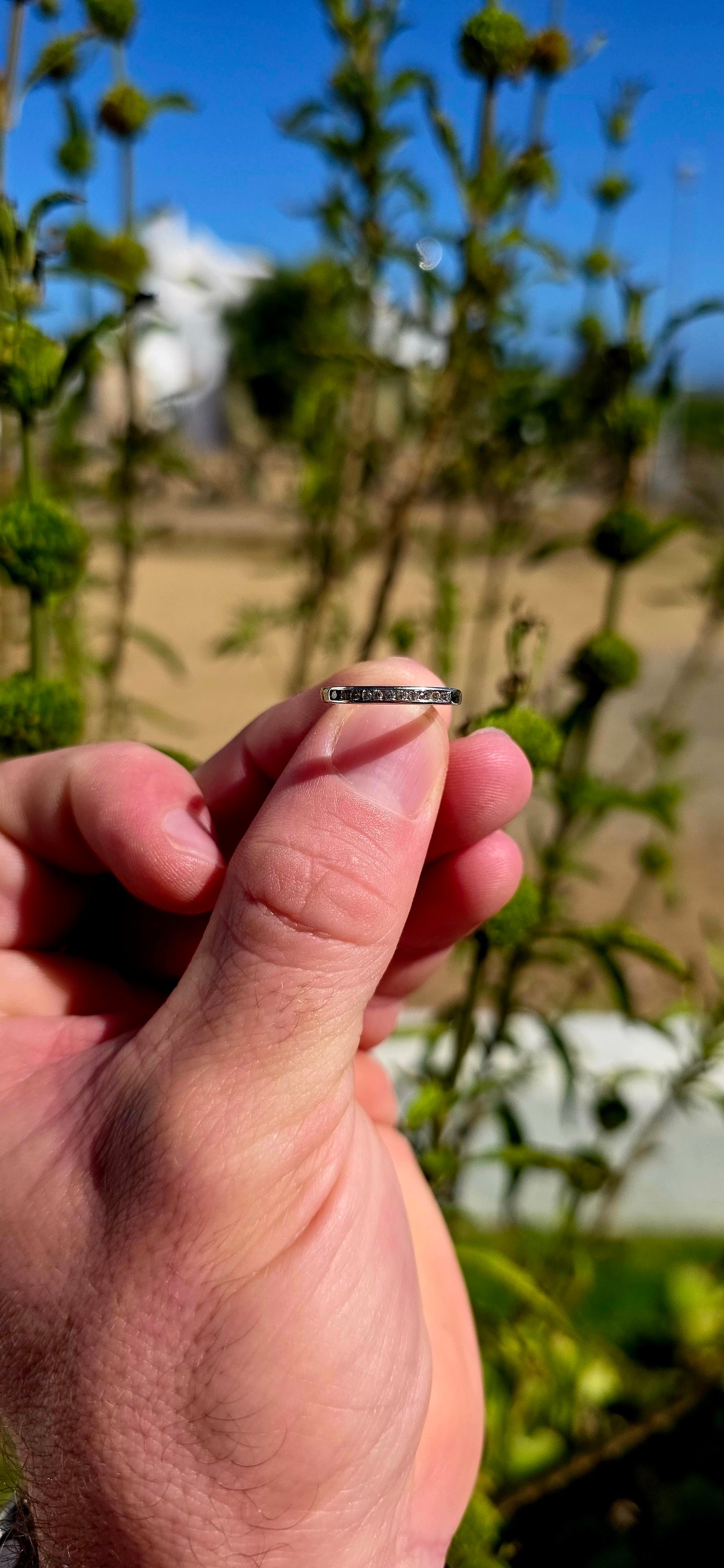 A beautifully refined 9ct white gold stacking ring, designed with a sleek, minimal profile that hugs the finger perfectly.
