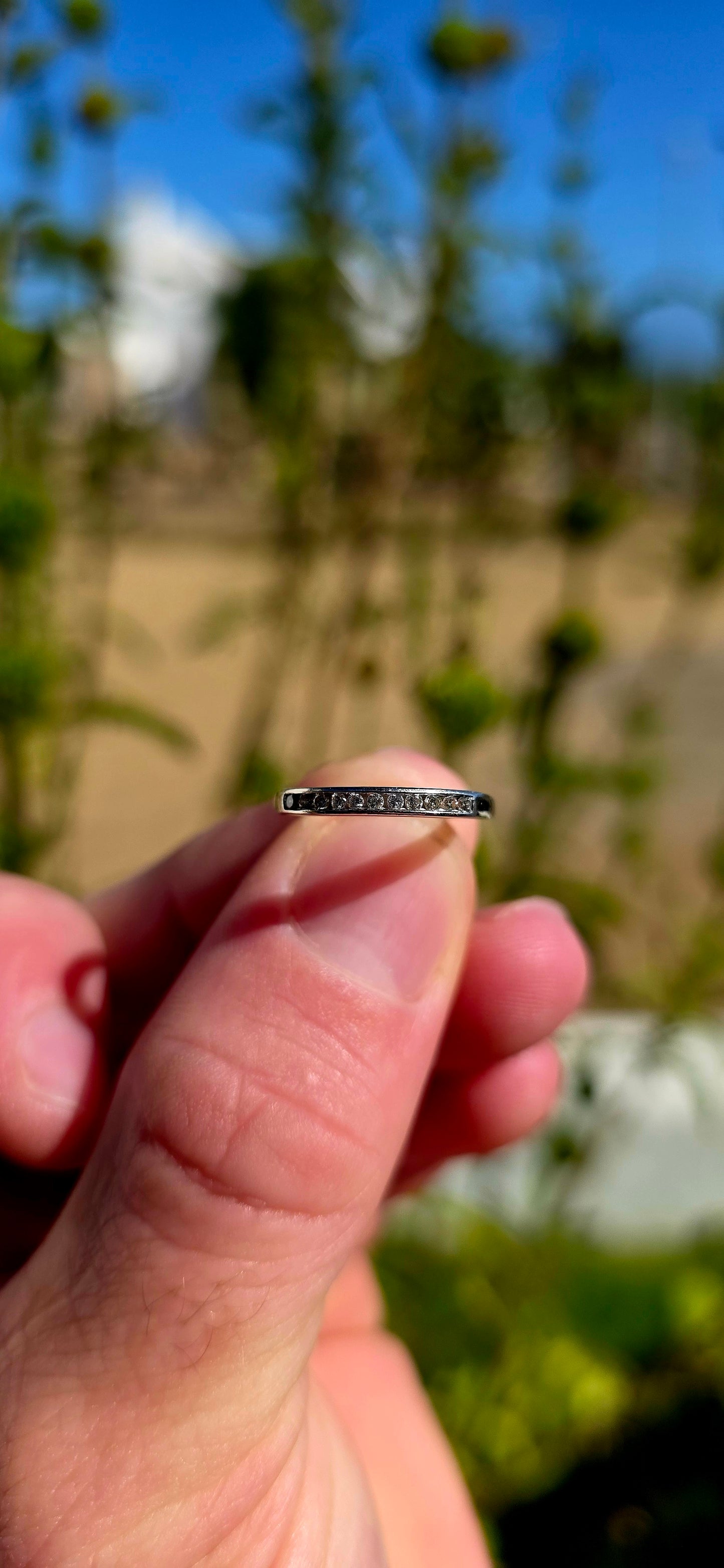 A beautifully refined 9ct white gold stacking ring, designed with a sleek, minimal profile that hugs the finger perfectly.