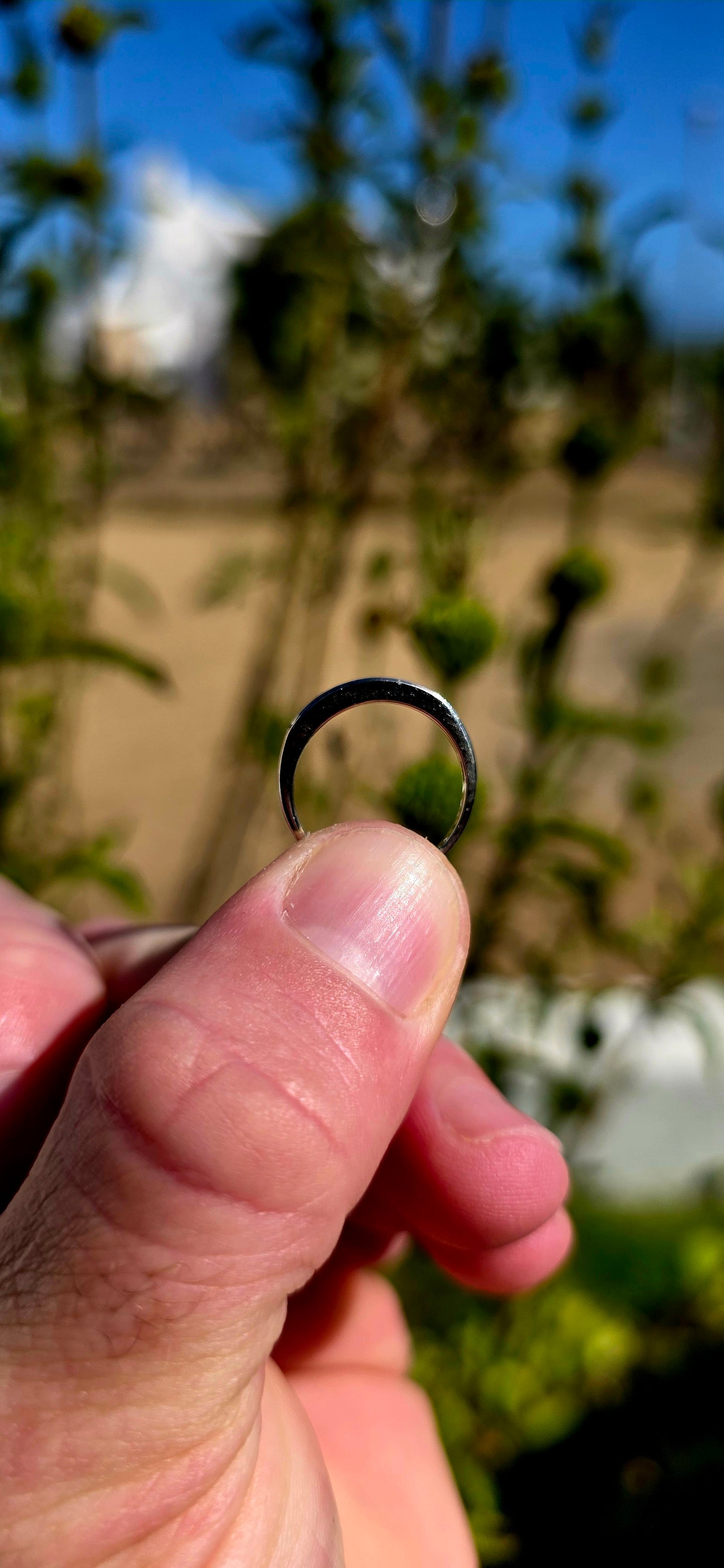 A beautifully refined 9ct white gold stacking ring, designed with a sleek, minimal profile that hugs the finger perfectly.