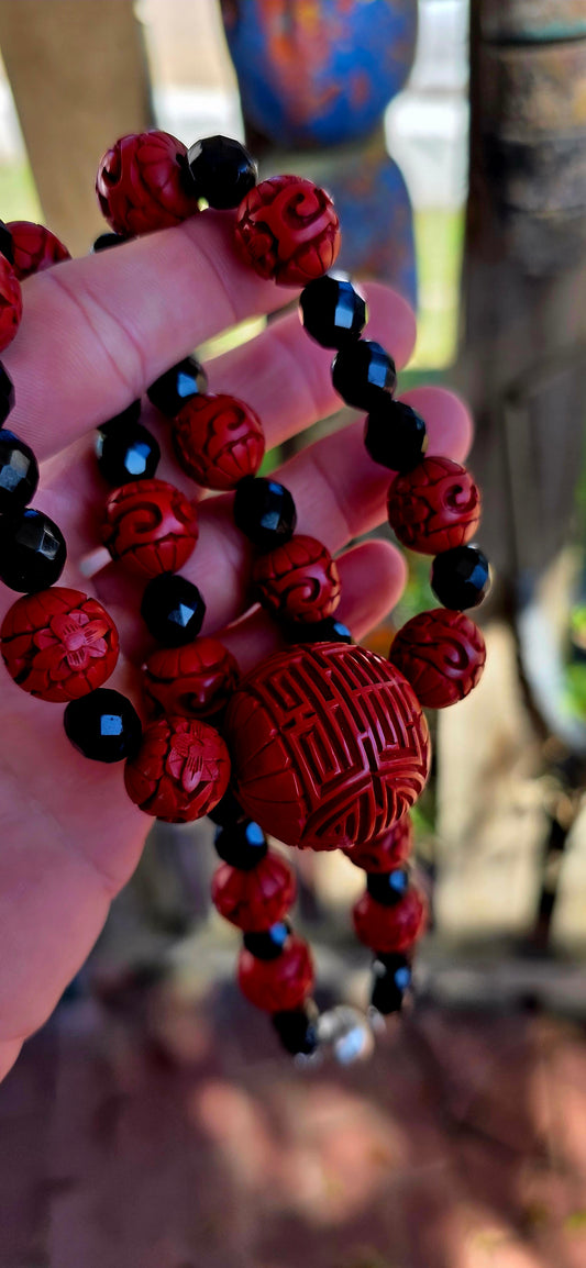 A striking mid-20th century Chinese export piece that blends ancient symbolism with bold, graphic contrast — and it absolutely commands attention.