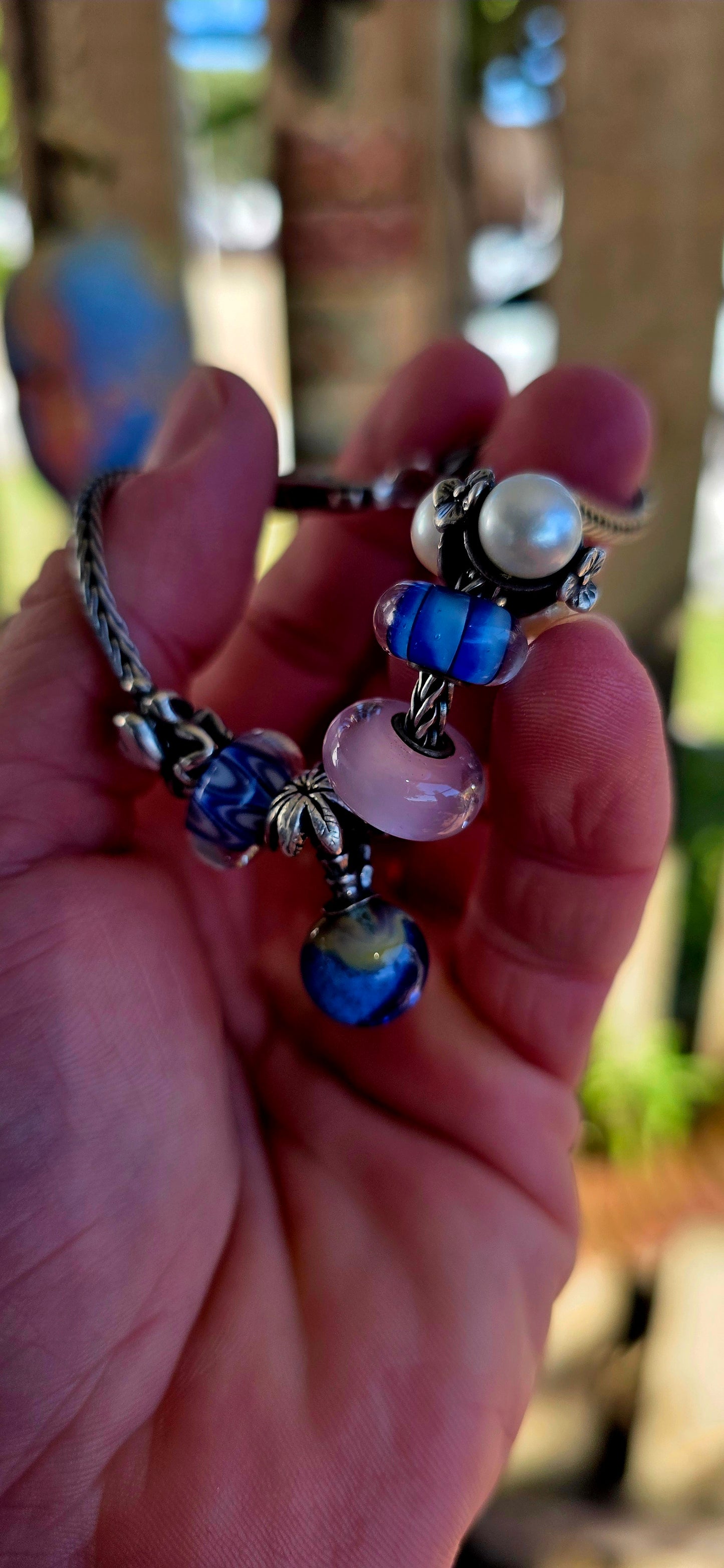 This one is pure magic on the wrist… a beautifully curated Trollbeads bracelet that feels like it was pulled straight from an enchanted shoreline