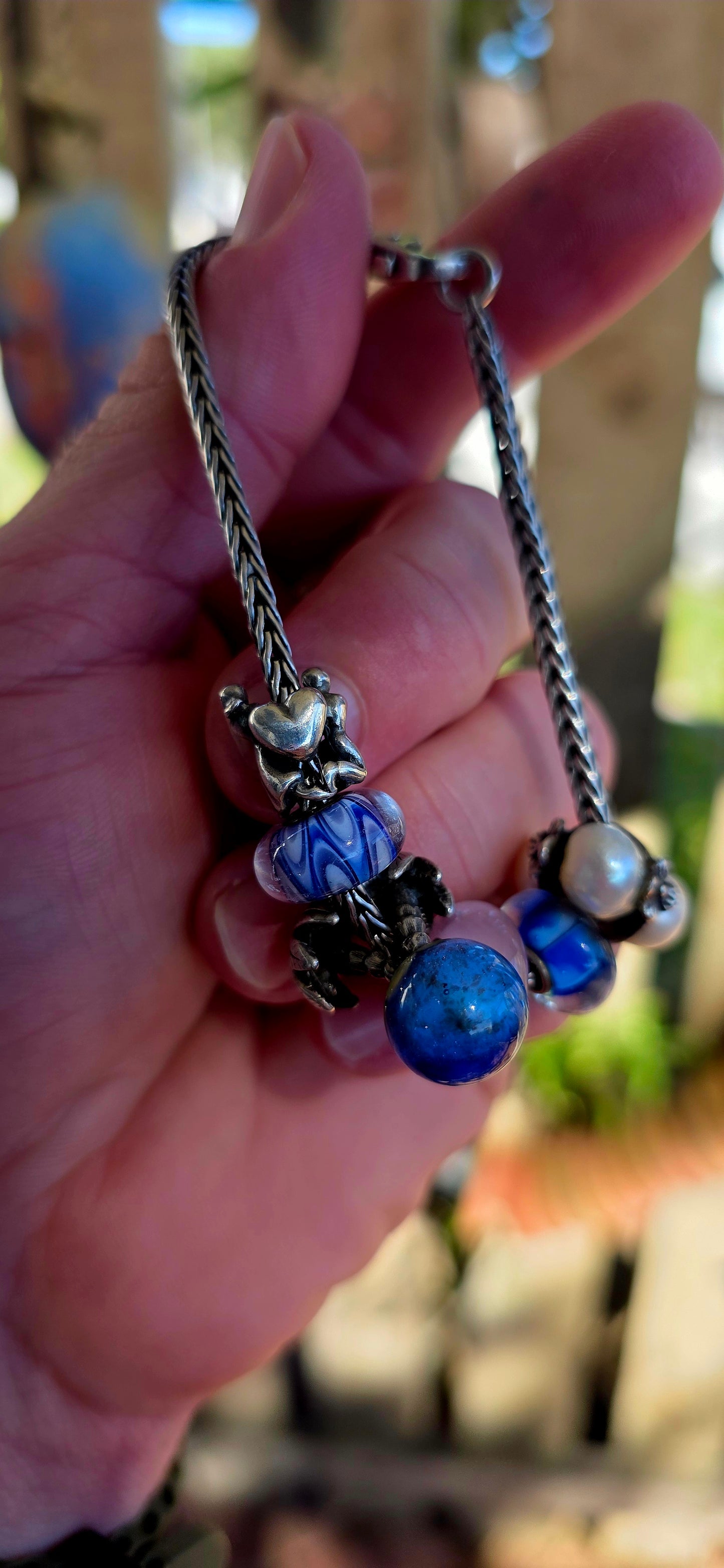 This one is pure magic on the wrist… a beautifully curated Trollbeads bracelet that feels like it was pulled straight from an enchanted shoreline
