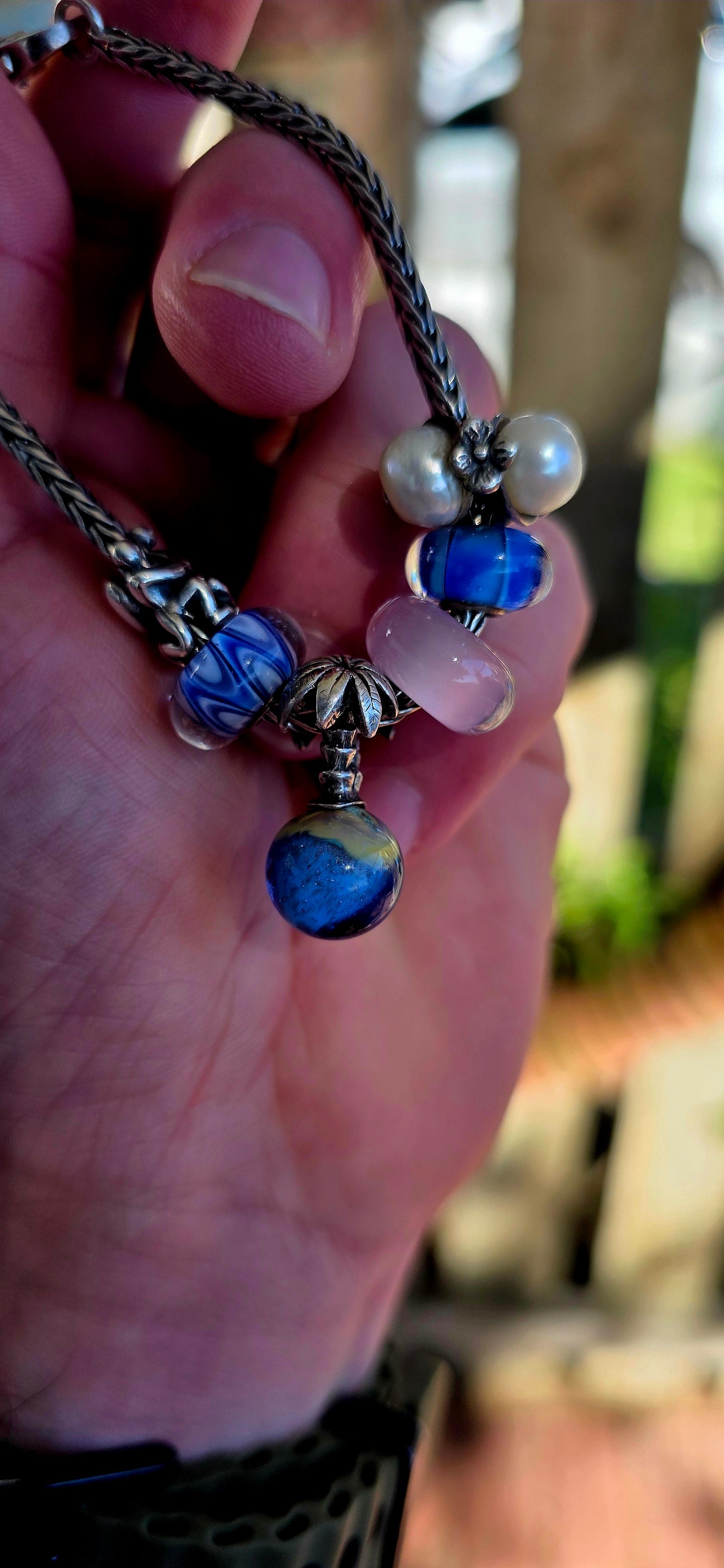 This one is pure magic on the wrist… a beautifully curated Trollbeads bracelet that feels like it was pulled straight from an enchanted shoreline