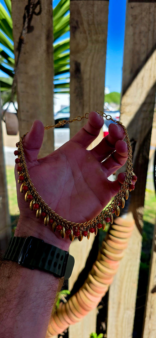 This marvelous vintage designer collar necklace was created by the renowned American costume jewellery house Monet and dates to the 1980s, a decade known for bold statement jewellery and rich, globally inspired design.