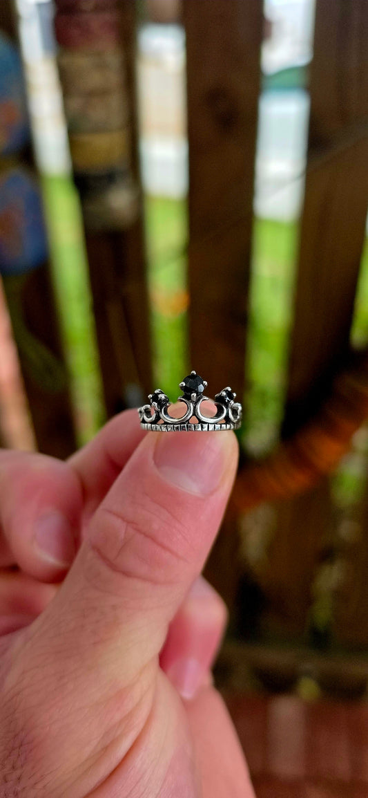 A ring fit for royalty… but make it dark, dramatic, and unapologetically bold.