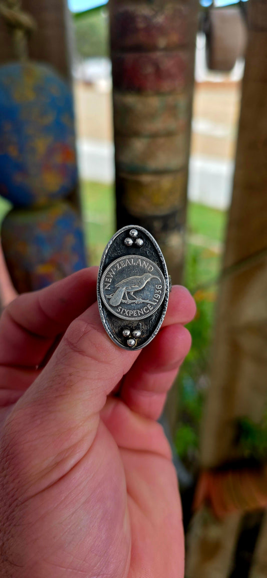 A bold, story-rich piece that fuses history, craftsmanship, and raw presence into one unforgettable ring.
