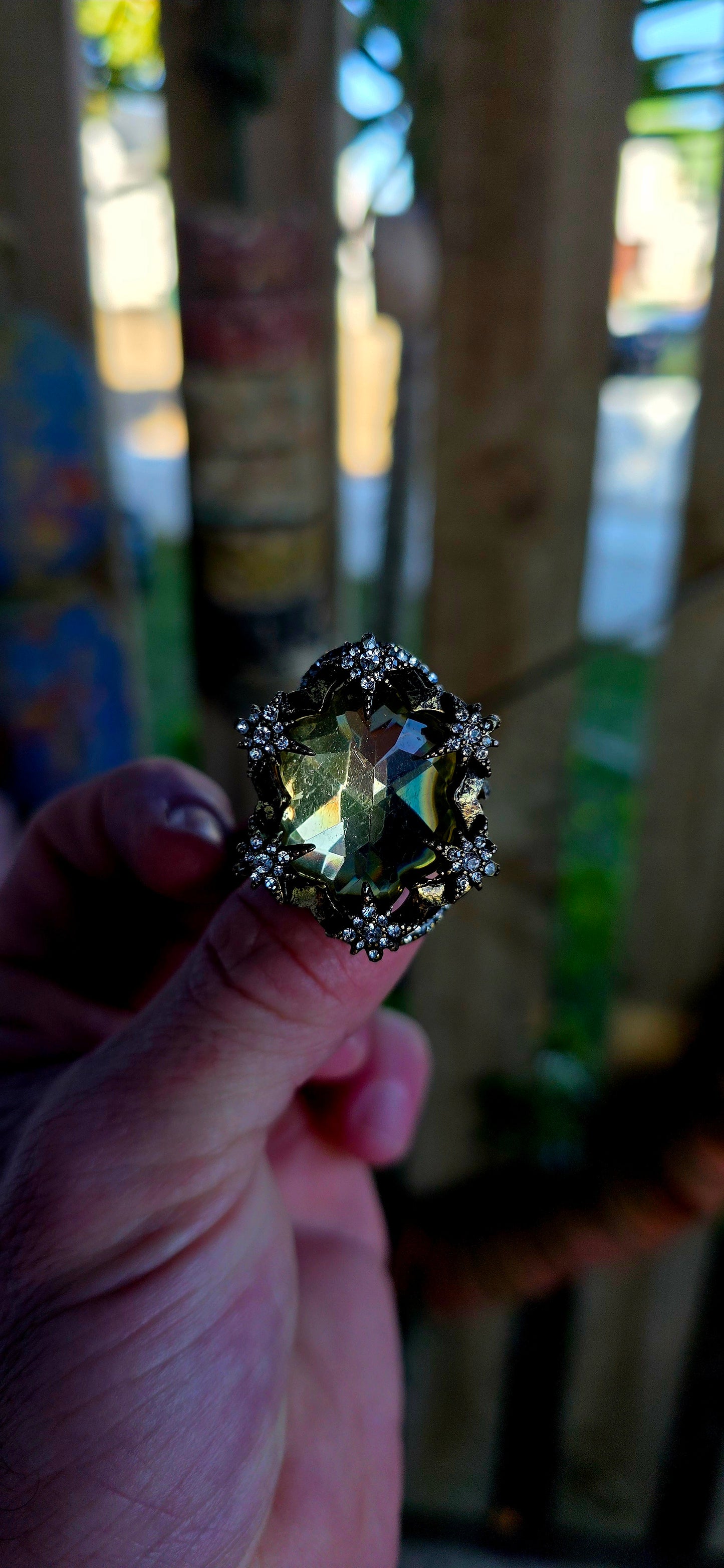 Marvelous oversized Victorian Revival costume dress ring crafted in richly antiqued brass, overflowing with old-world gothic glamour and theatrical sparkle.