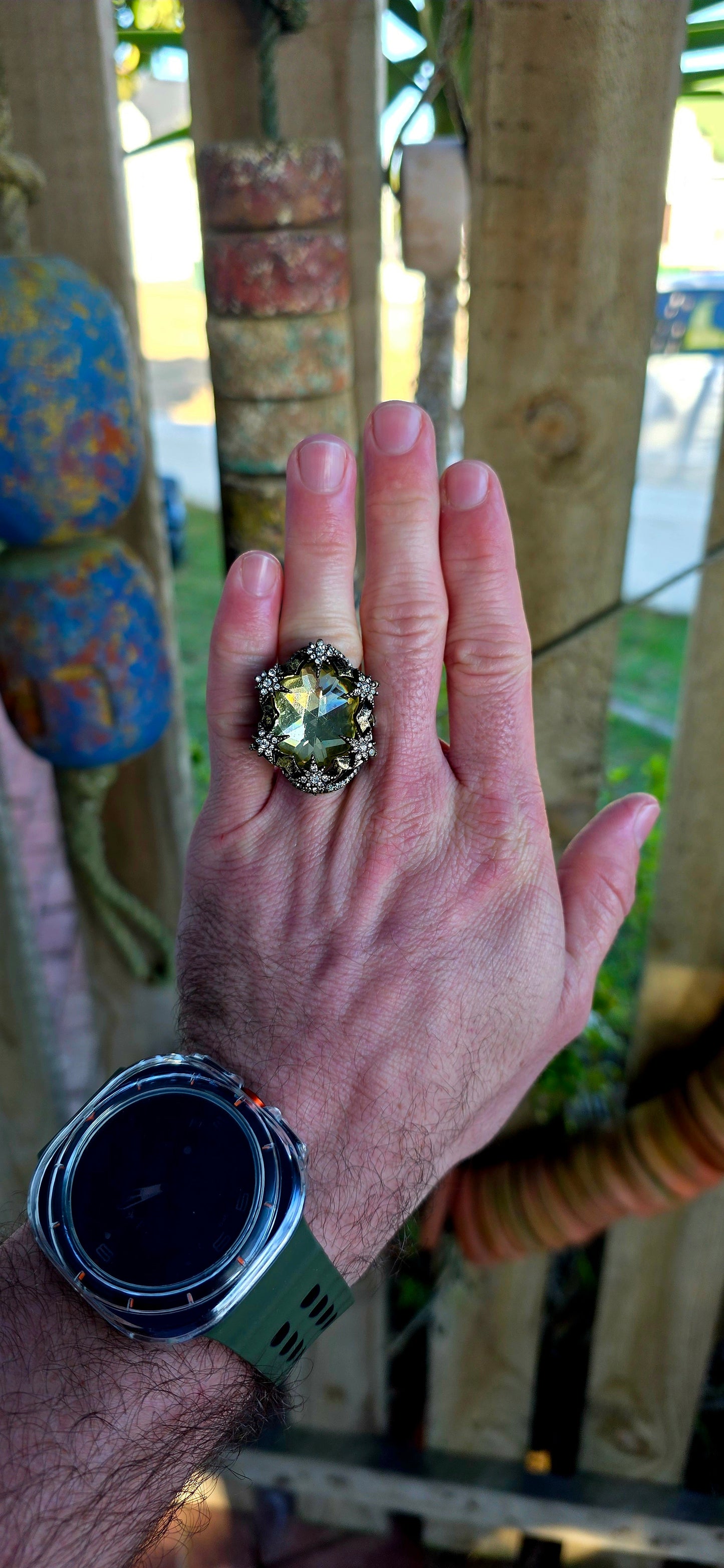 Marvelous oversized Victorian Revival costume dress ring crafted in richly antiqued brass, overflowing with old-world gothic glamour and theatrical sparkle.