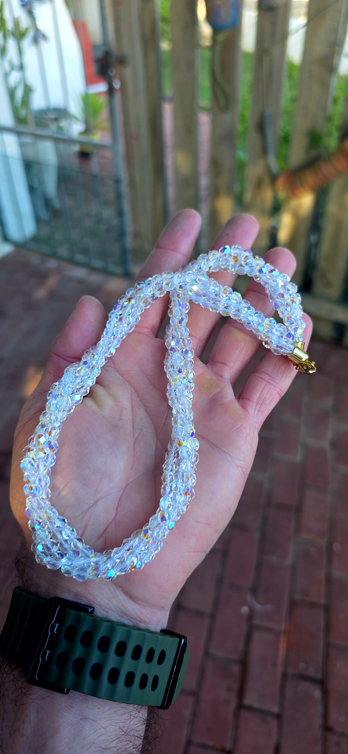 Absolutely mesmerizing vintage circa 1980’s twisted four-strand aurora borealis crystal necklace — and WOW does this beauty know how to catch the light!