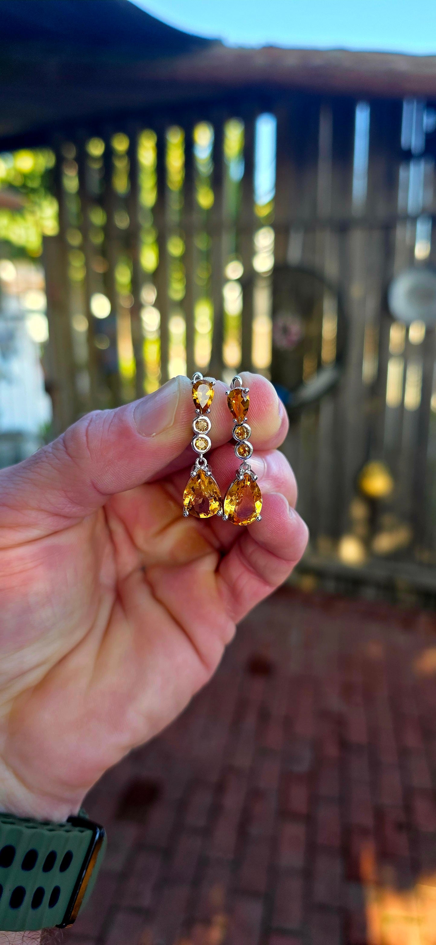 Absolutely radiant pair of sterling silver citrine drop earrings, glowing in the richest honey-golden tones.