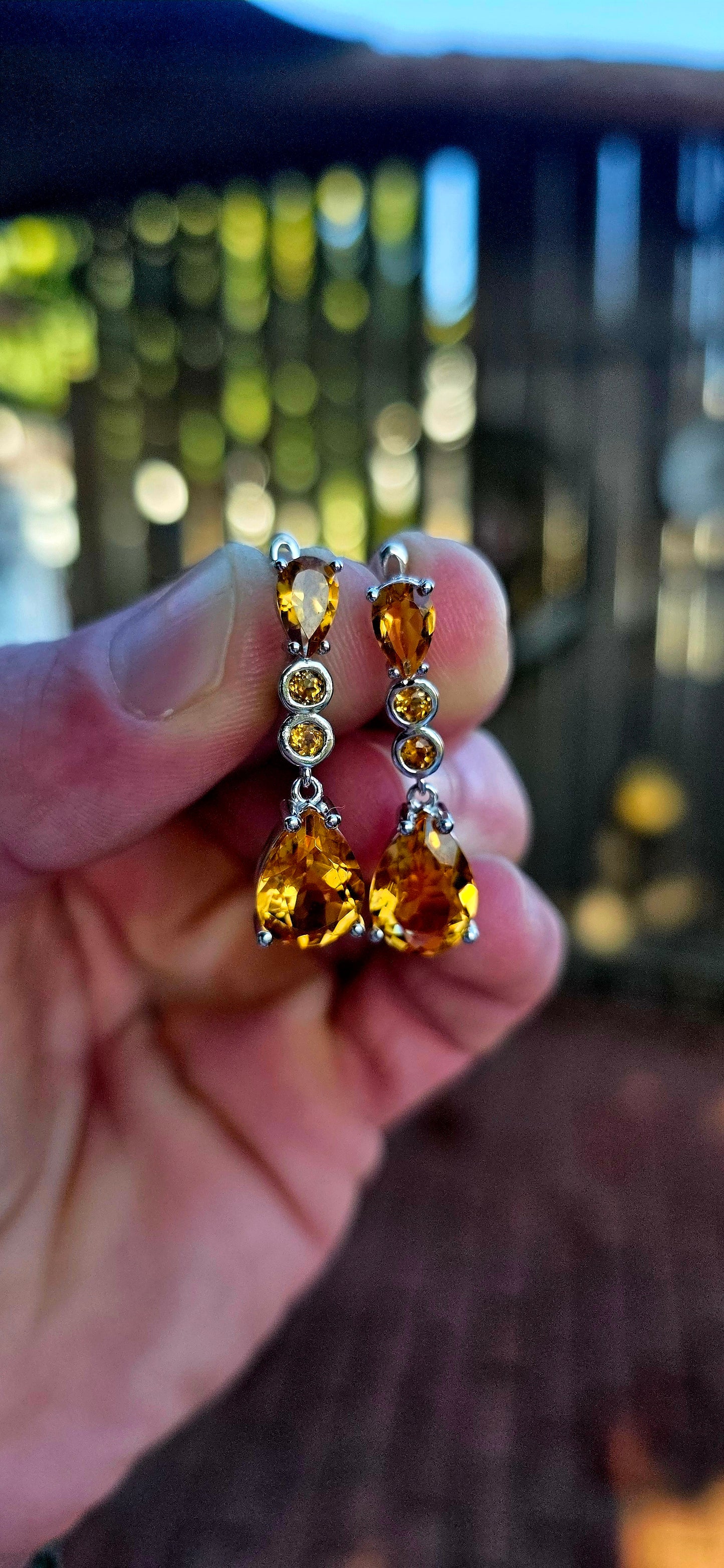 Absolutely radiant pair of sterling silver citrine drop earrings, glowing in the richest honey-golden tones.