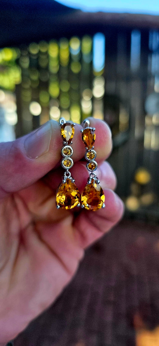 Absolutely radiant pair of sterling silver citrine drop earrings, glowing in the richest honey-golden tones.