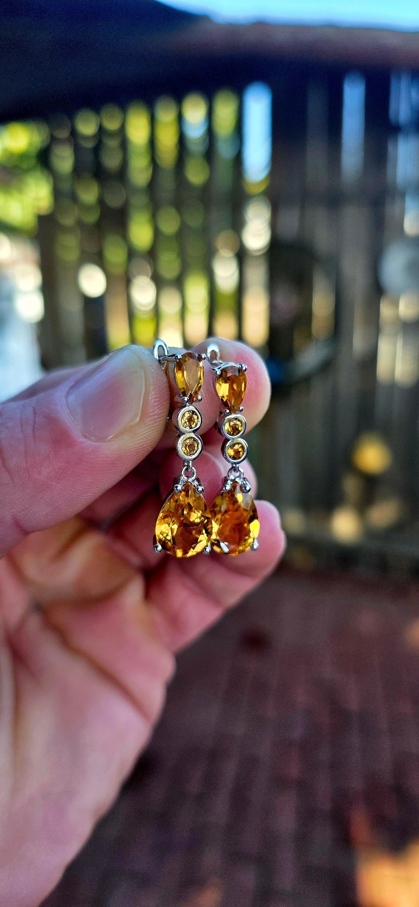 Absolutely radiant pair of sterling silver citrine drop earrings, glowing in the richest honey-golden tones.