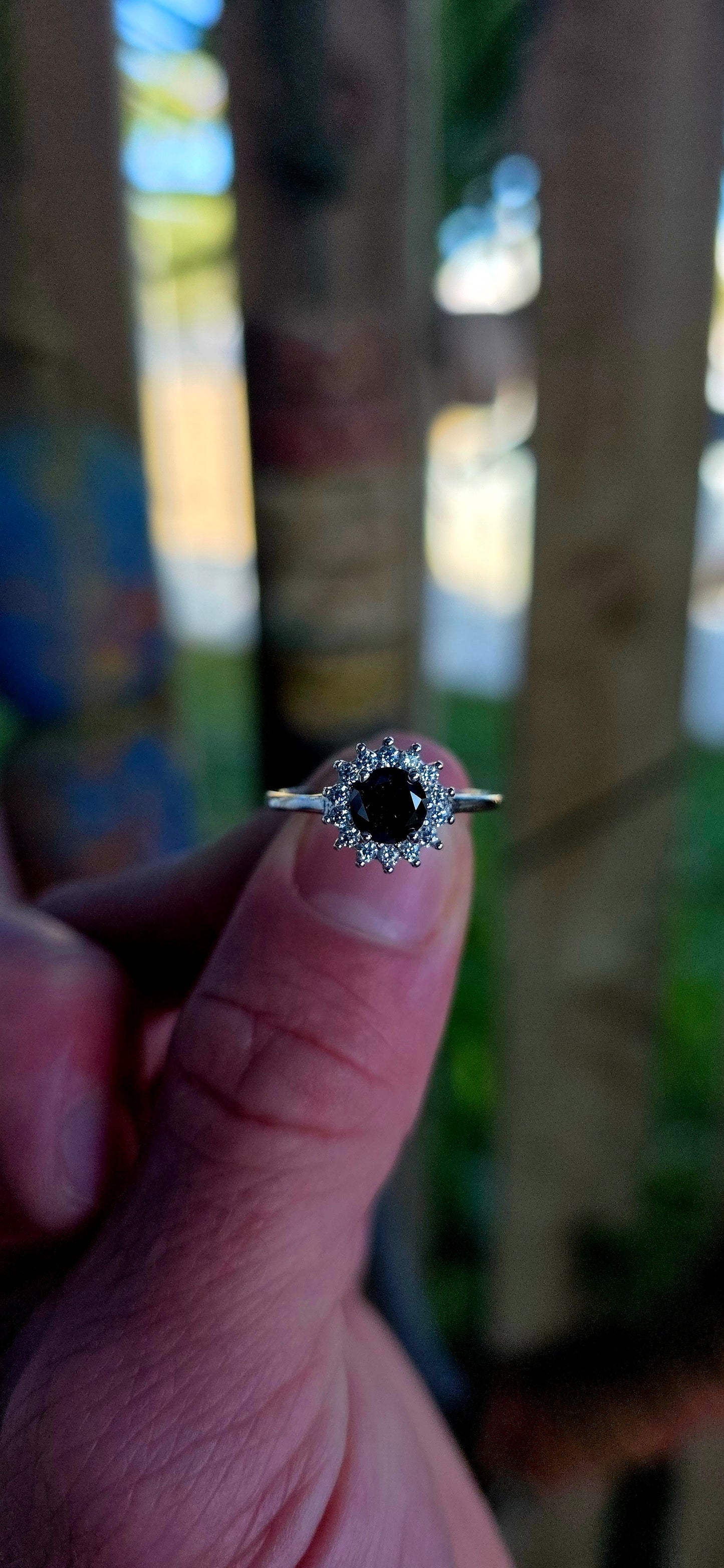 Striking sterling silver statement ring featuring a richly faceted round-cut black diamond of approximately 1ct, resting proudly in a classic prong setting.