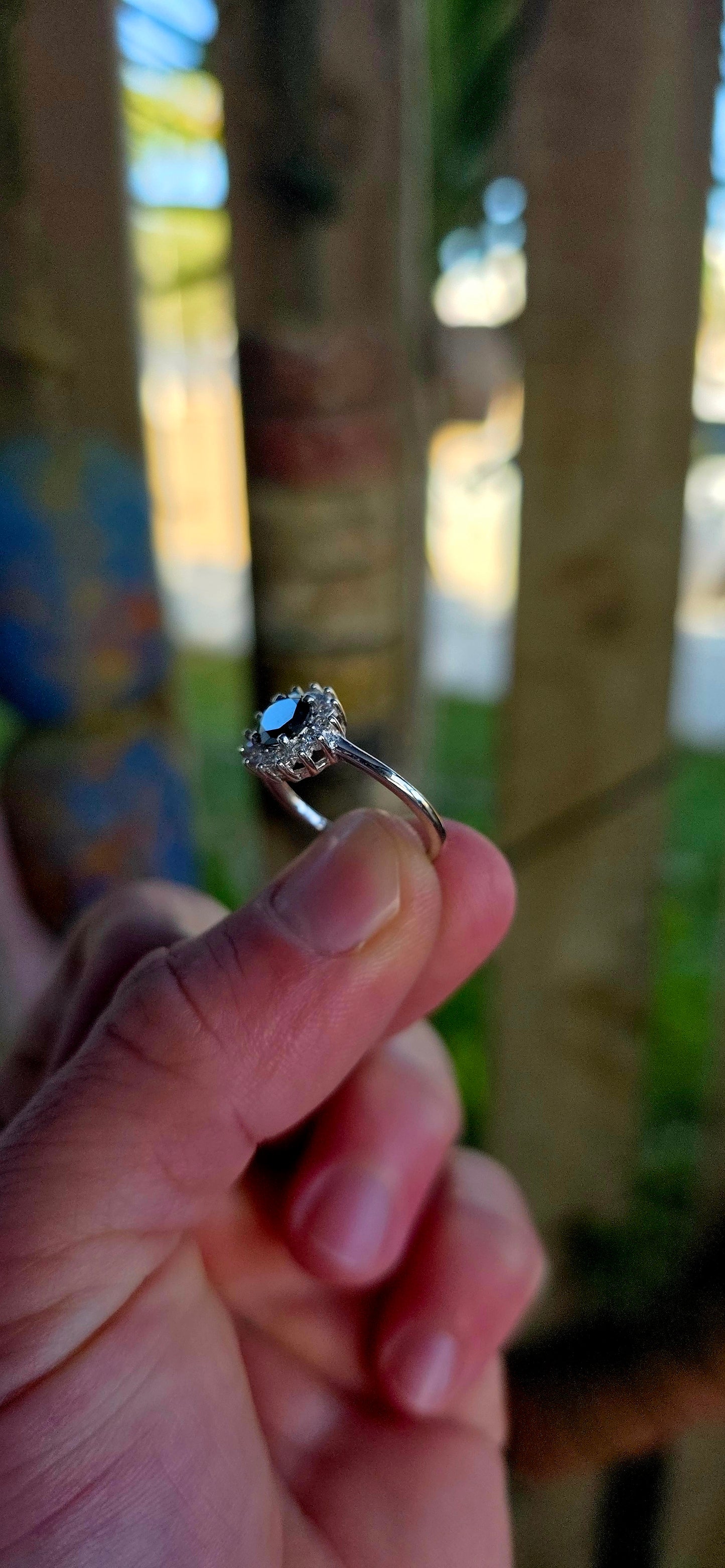 Striking sterling silver statement ring featuring a richly faceted round-cut black diamond of approximately 1ct, resting proudly in a classic prong setting.