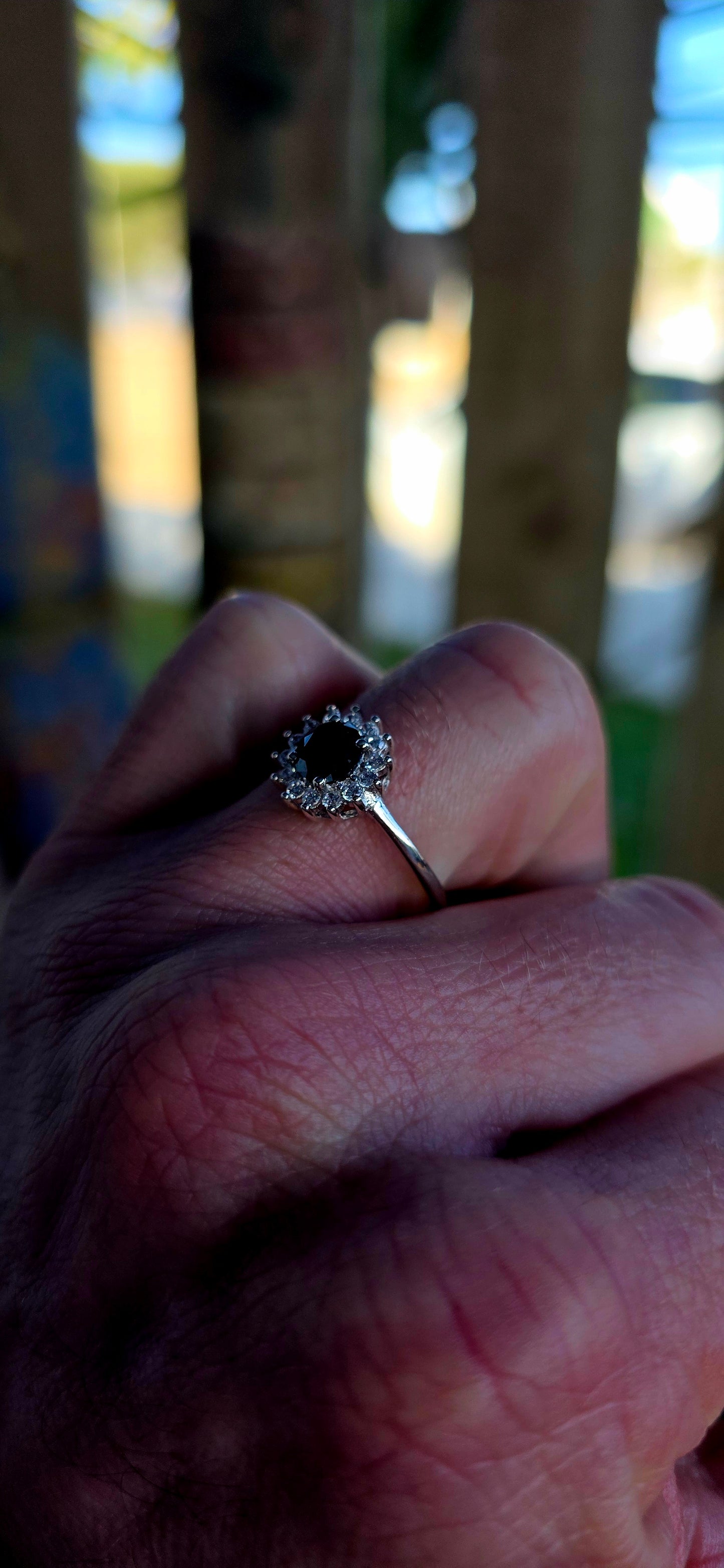 Striking sterling silver statement ring featuring a richly faceted round-cut black diamond of approximately 1ct, resting proudly in a classic prong setting.