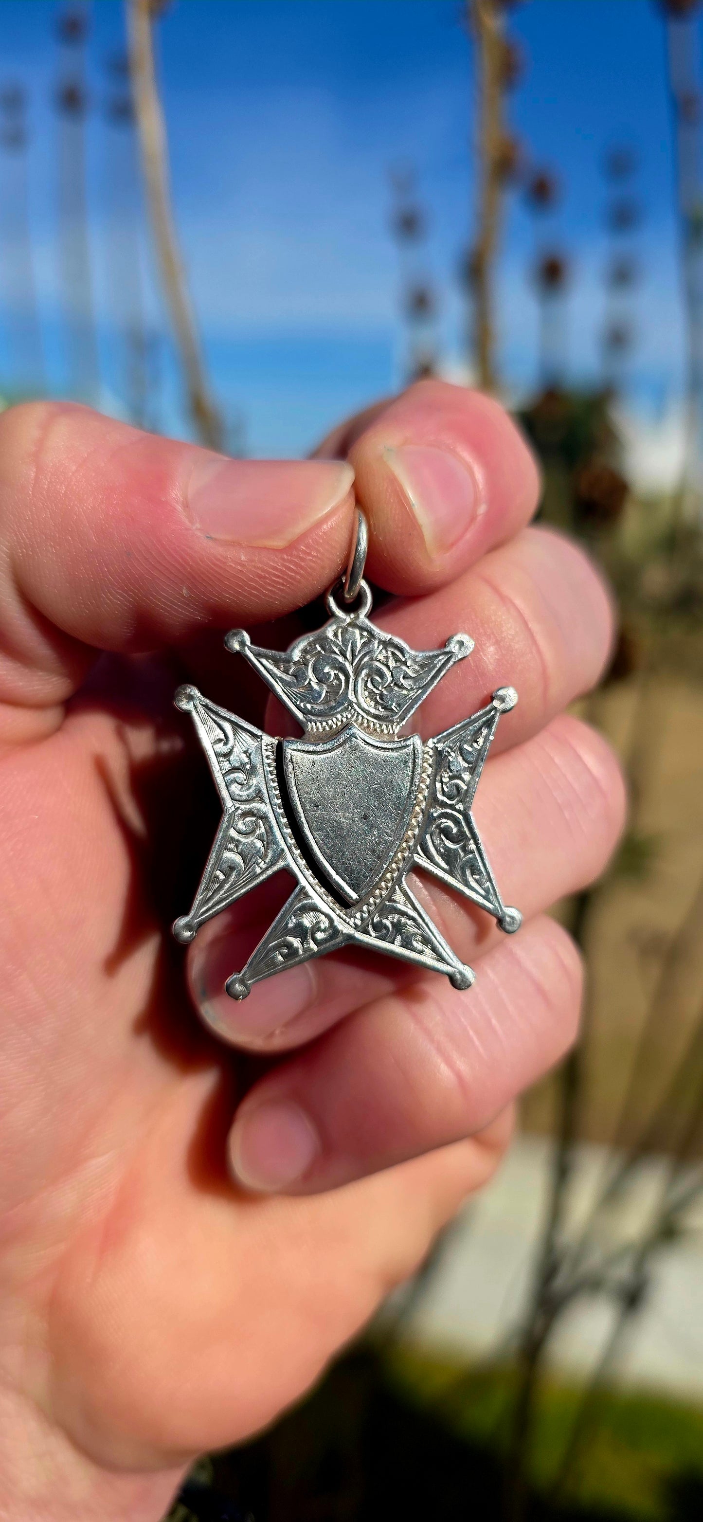 A substantial antique Hallmarked sterling silver fob pendant, fully hallmarked for Birmingham, 1918, and crafted by H.W. Ashford & Co — a respected name in English silversmithing.
