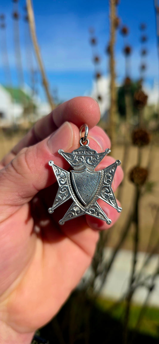 A substantial antique Hallmarked sterling silver fob pendant, fully hallmarked for Birmingham, 1918, and crafted by H.W. Ashford & Co — a respected name in English silversmithing.