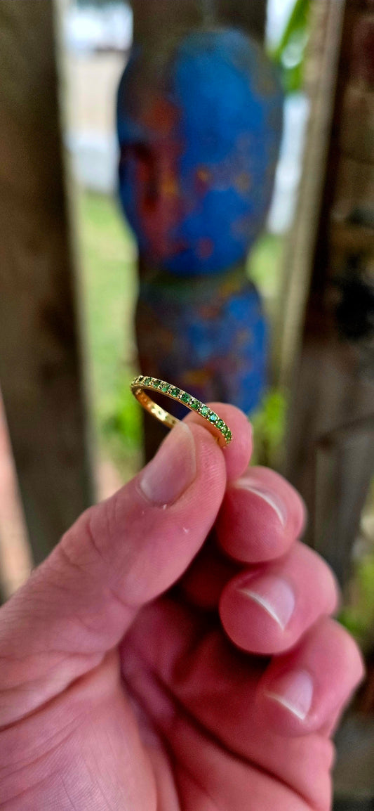 A fine and dainty full eternity stacking band, crafted in solid sterling silver and finished in glowing 18ct yellow gold plating for that rich golden warmth.