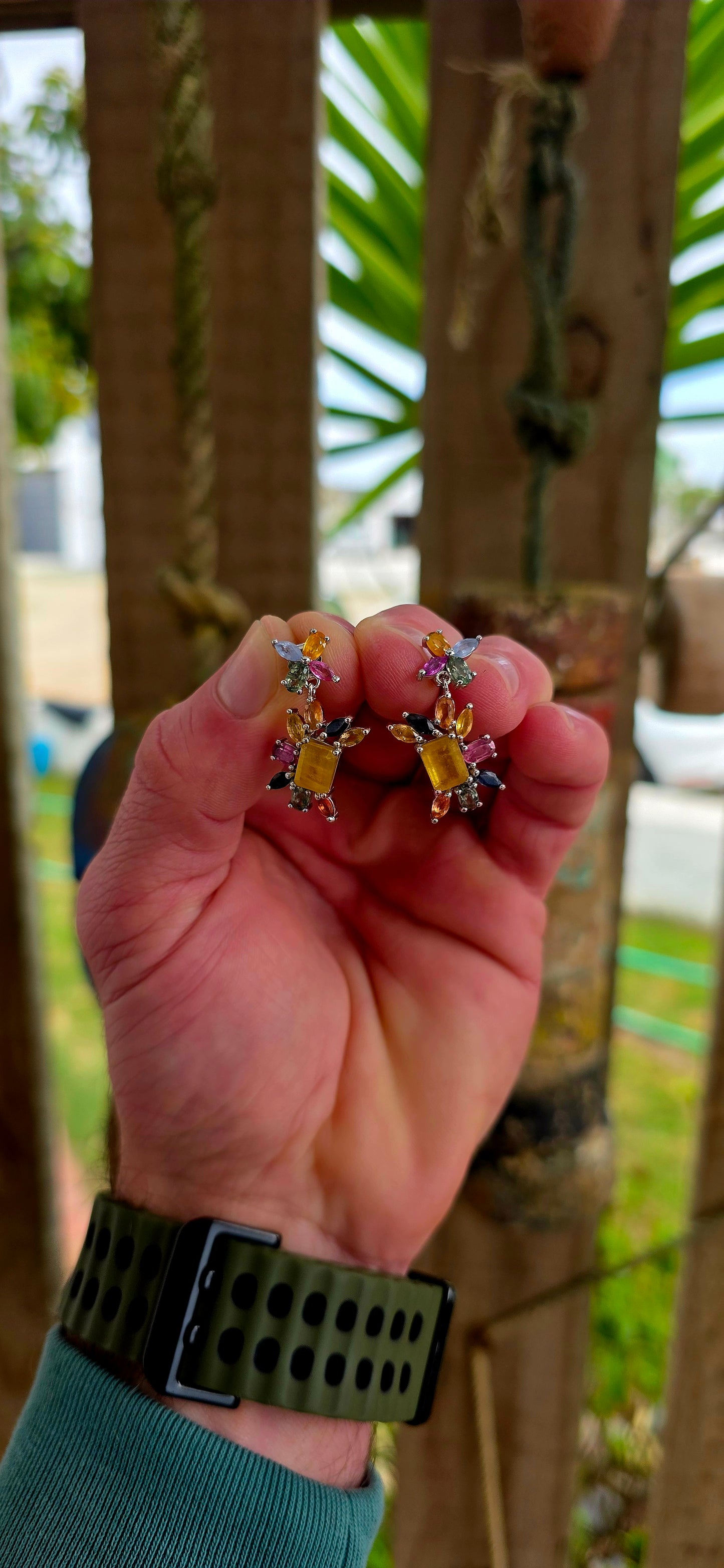 Absolutely enchanting and bursting with joyful colour .These sterling silver floral-inspired drop earrings are a true celebration of vibrant gemstones and playful elegance.