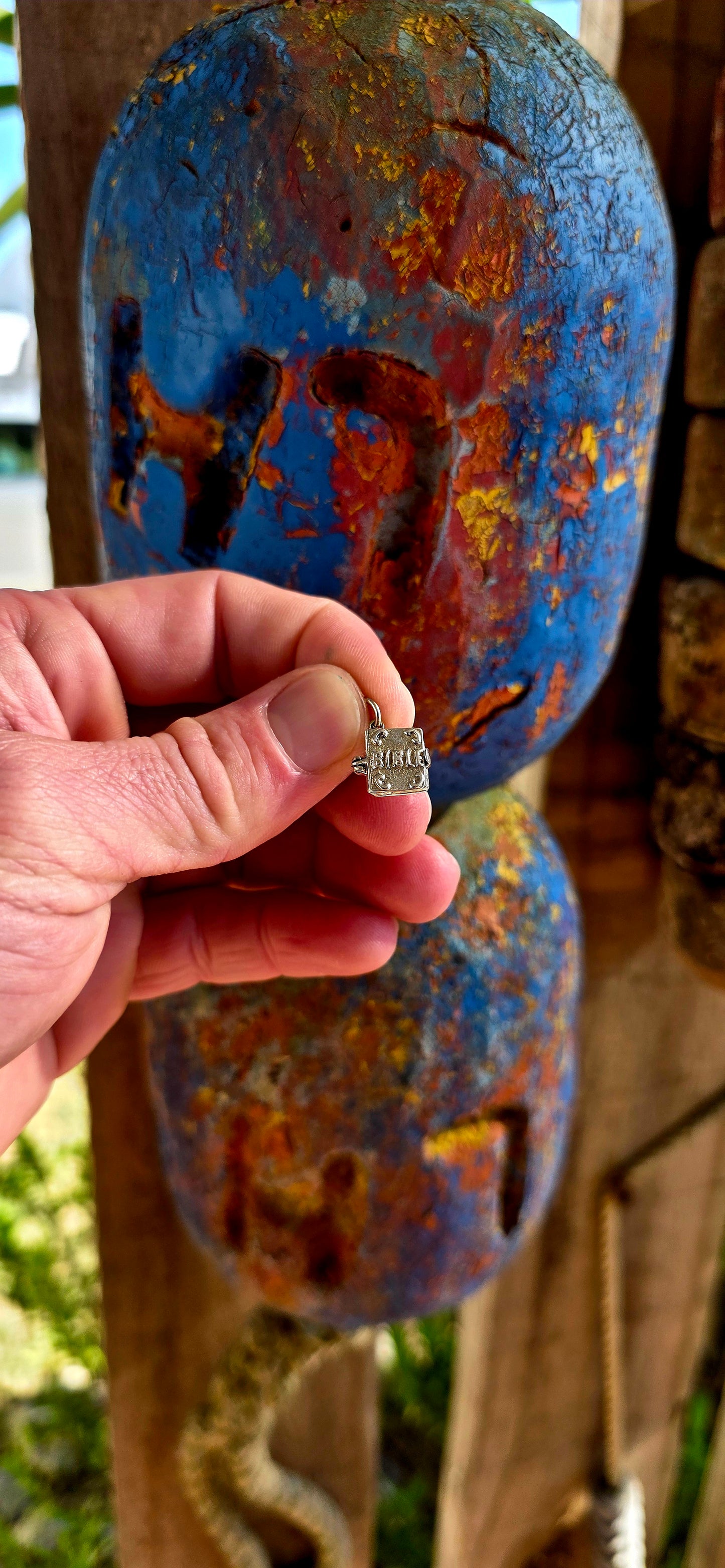 Up for grabs is the sweetest vintage sterling silver articulated charm in the shape of a miniature Bible.