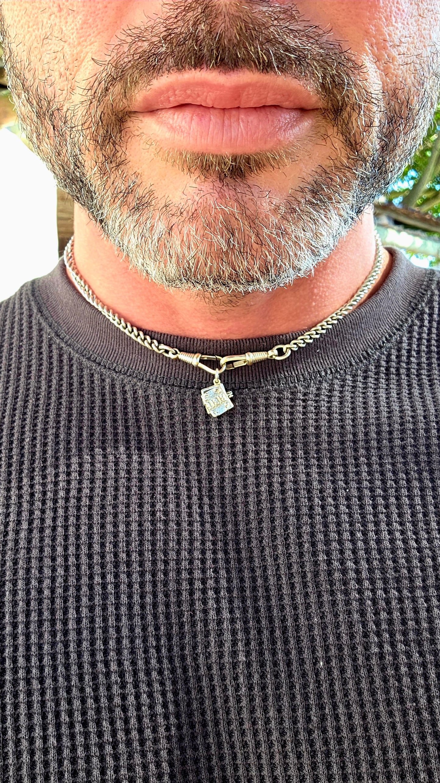 Up for grabs is the sweetest vintage sterling silver articulated charm in the shape of a miniature Bible.