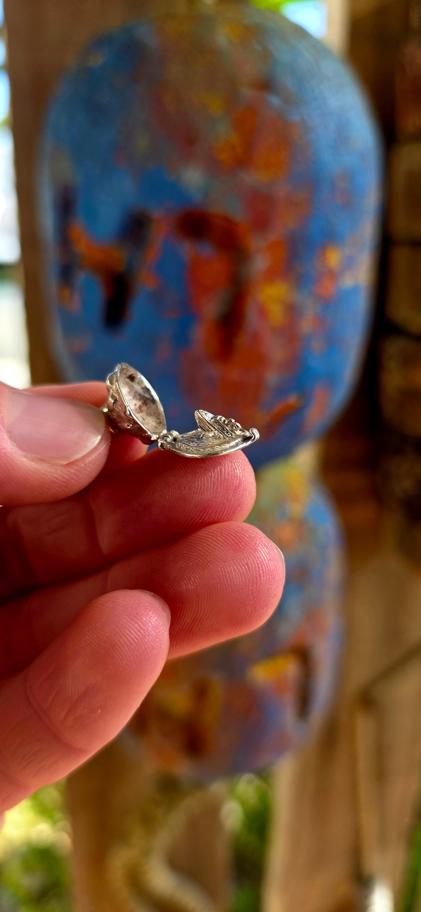 Up for grabs is the most magical vintage sterling silver articulated charm in the shape of a tiny lighthouse .