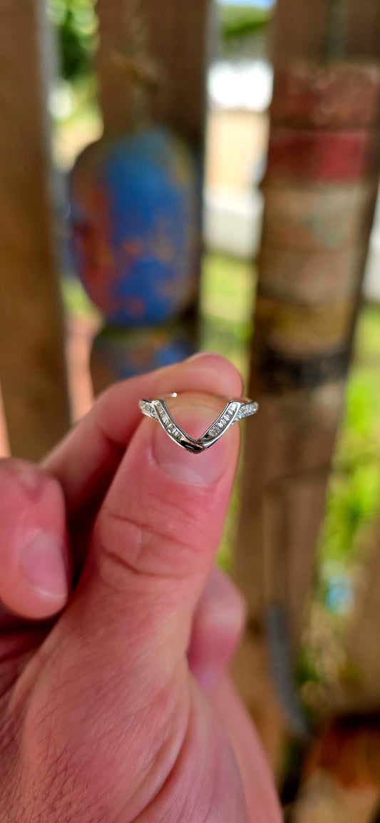 A beautifully contemporary piece that plays with form, light, and clean design — perfect for stacking, styling, or wearing solo.