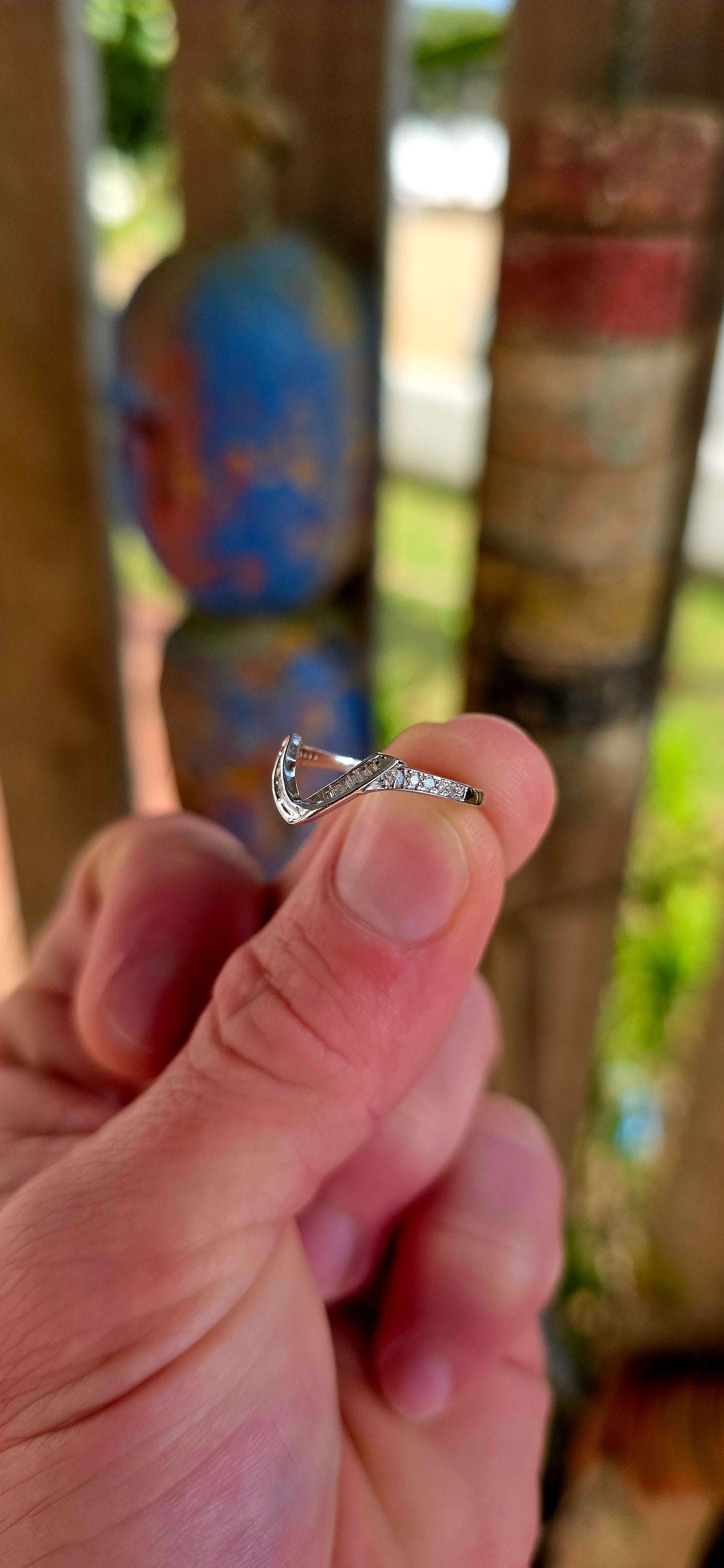 A beautifully contemporary piece that plays with form, light, and clean design — perfect for stacking, styling, or wearing solo.