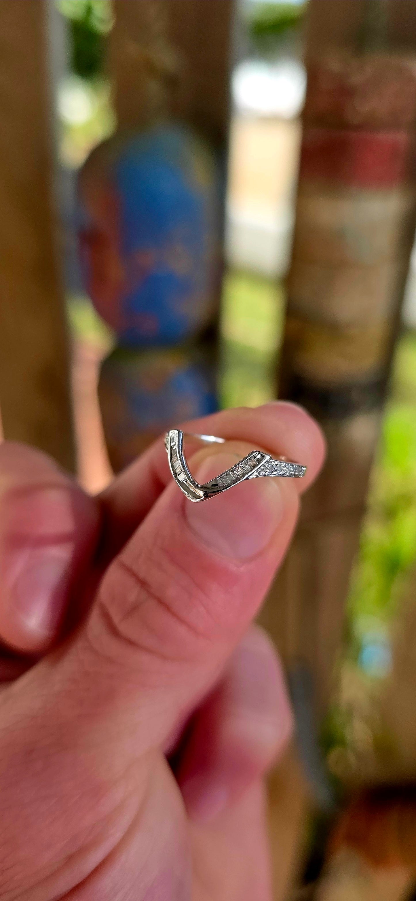 A beautifully contemporary piece that plays with form, light, and clean design — perfect for stacking, styling, or wearing solo.