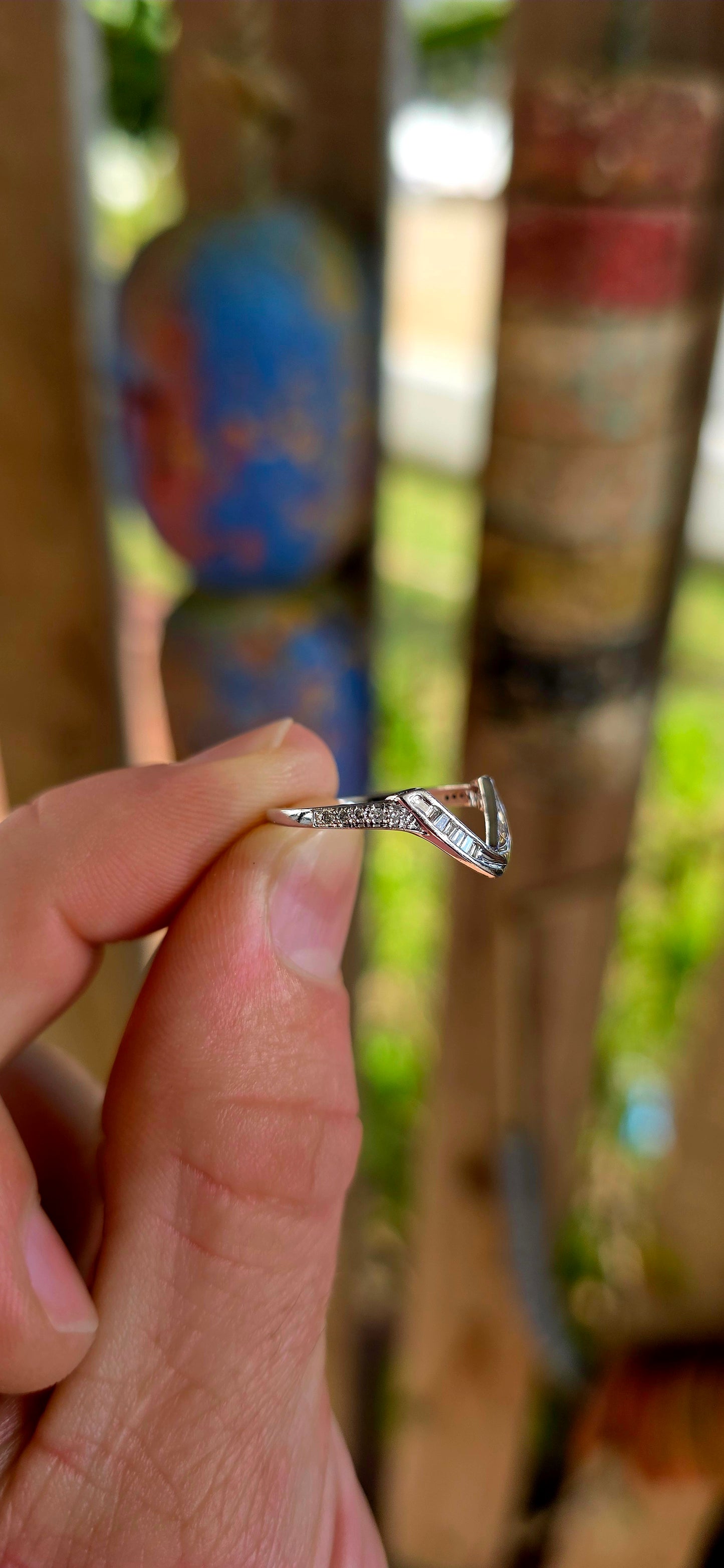 A beautifully contemporary piece that plays with form, light, and clean design — perfect for stacking, styling, or wearing solo.