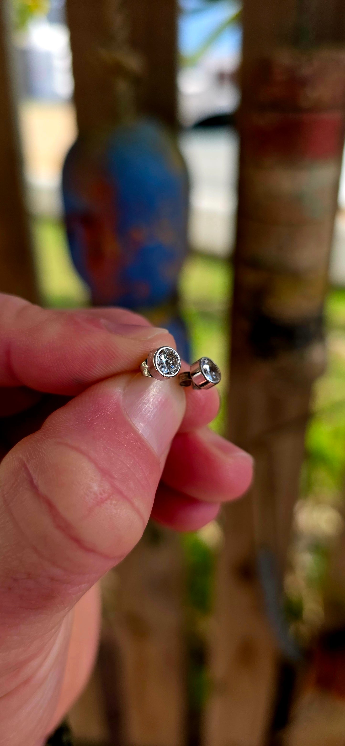 A beautifully classic pair of 9ct white gold solitaire stud earrings — elegant, and endlessly wearable.