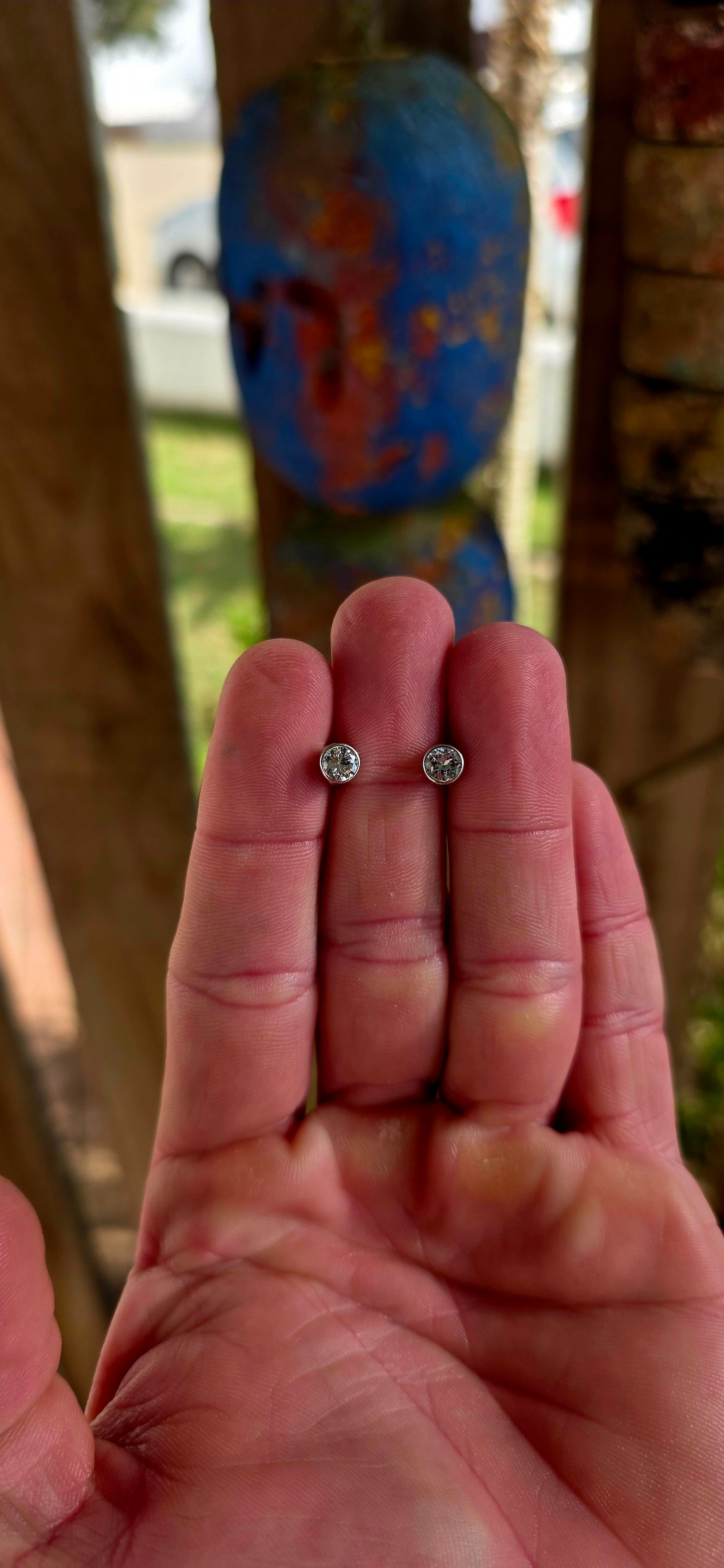 A beautifully classic pair of 9ct white gold solitaire stud earrings — elegant, and endlessly wearable.
