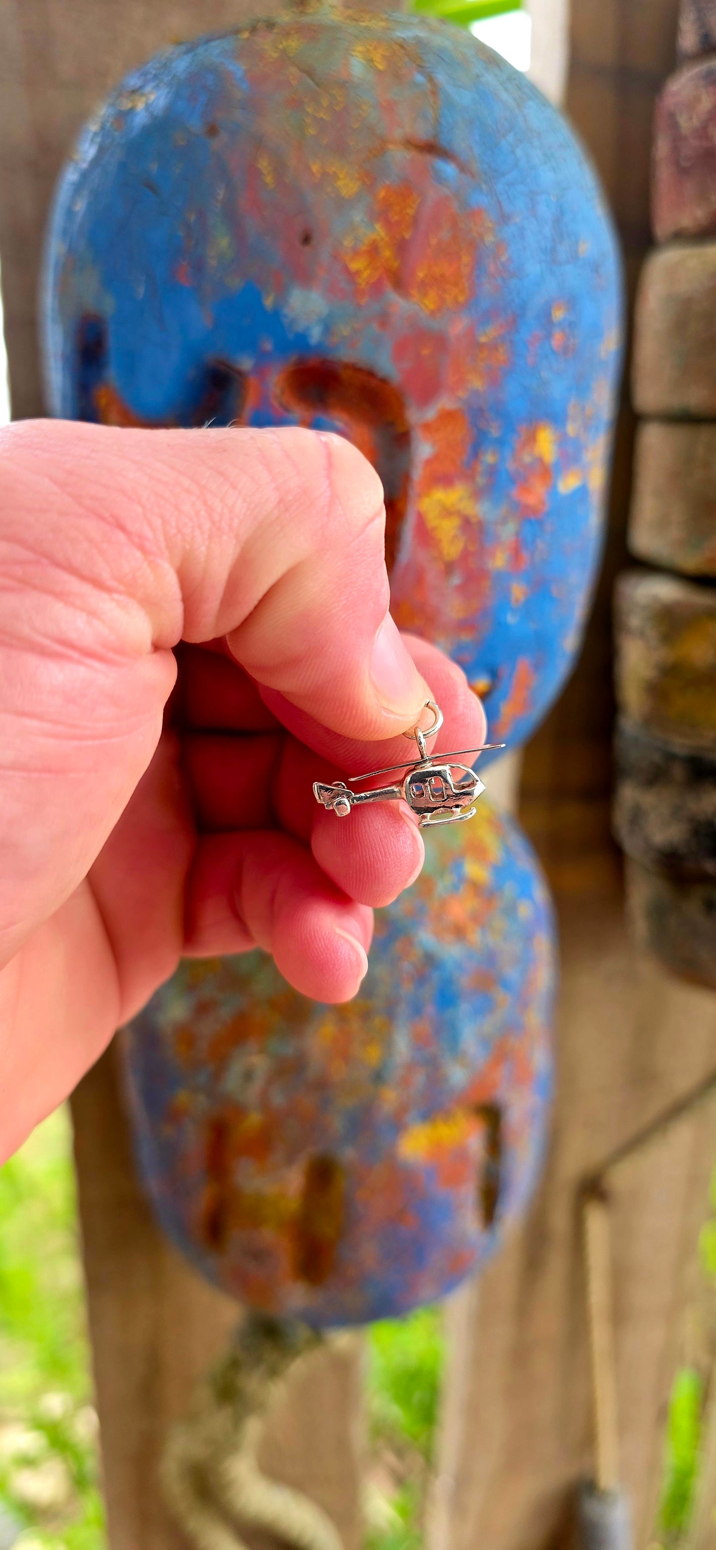 Delightful vintage sterling silver articulated charm in the shape of a tiny helicopter.