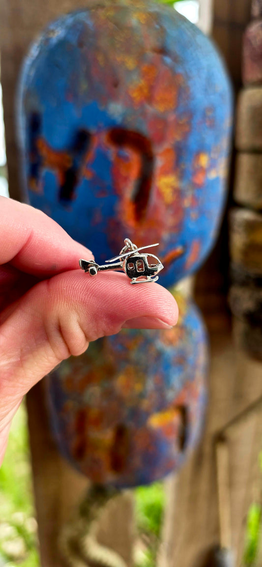 Delightful vintage sterling silver articulated charm in the shape of a tiny helicopter.