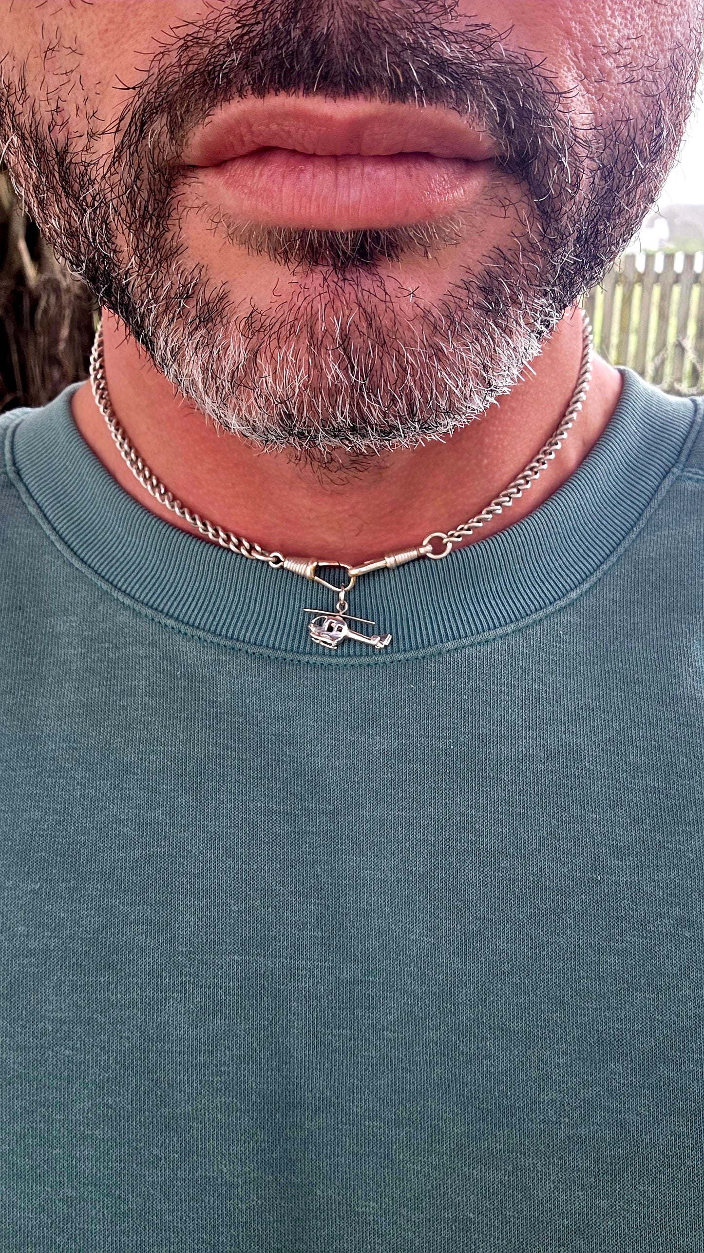 Delightful vintage sterling silver articulated charm in the shape of a tiny helicopter.